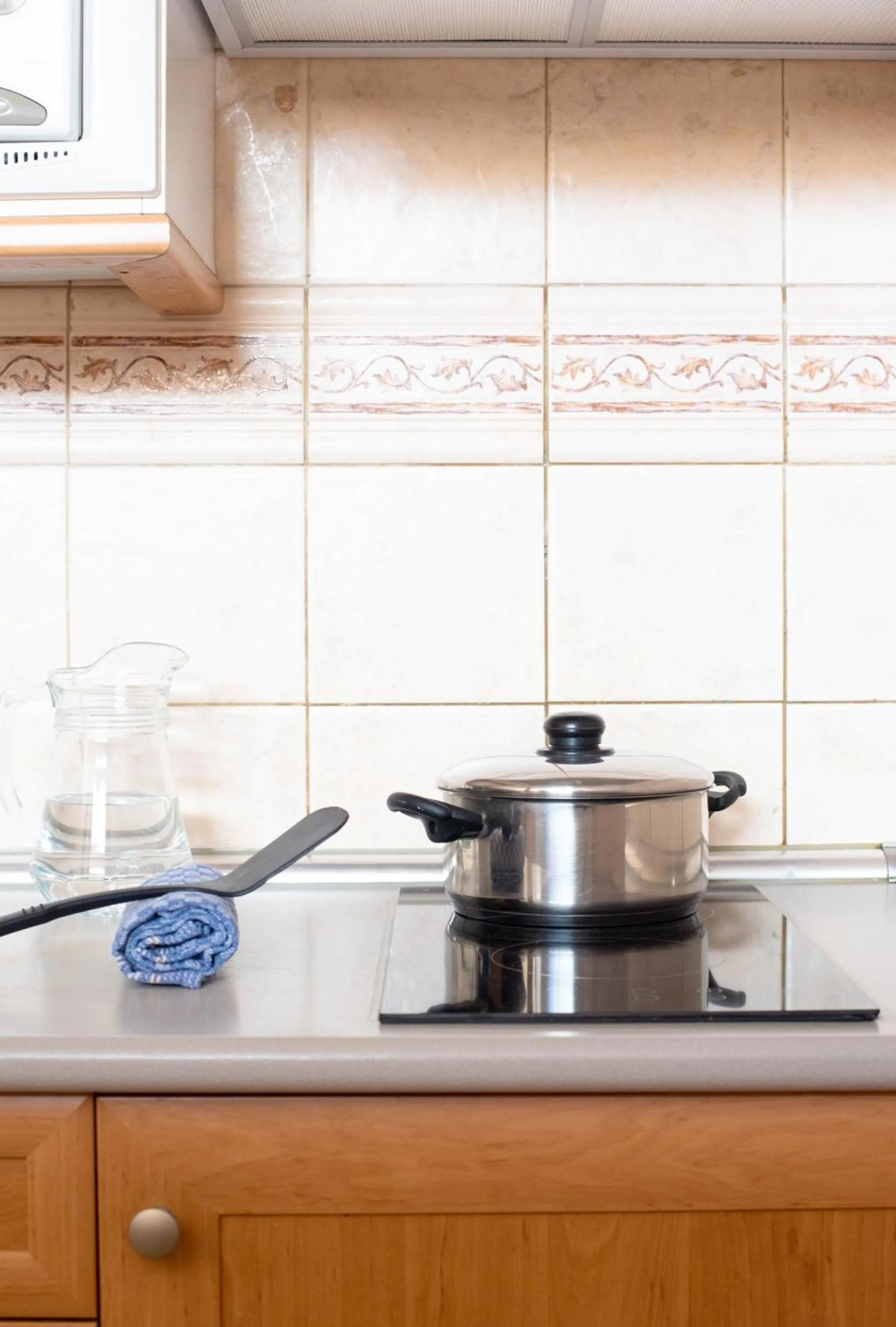 Kitchen or kitchenette in Apartamentos Punta Marina by LIVVO