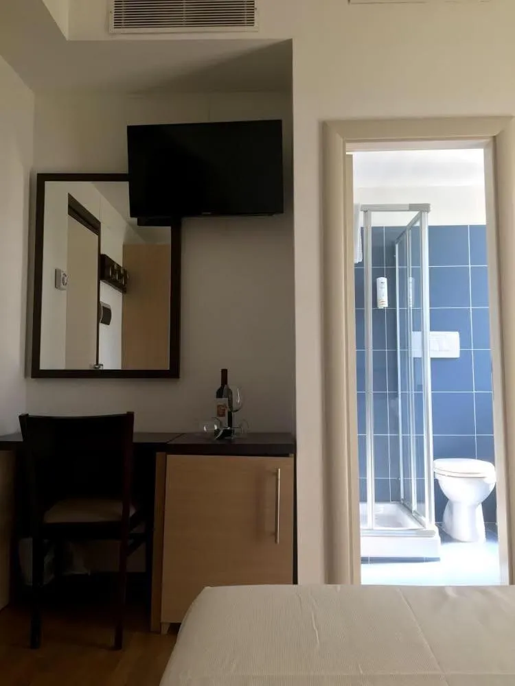 Toilet, Bed in Hotel Royal