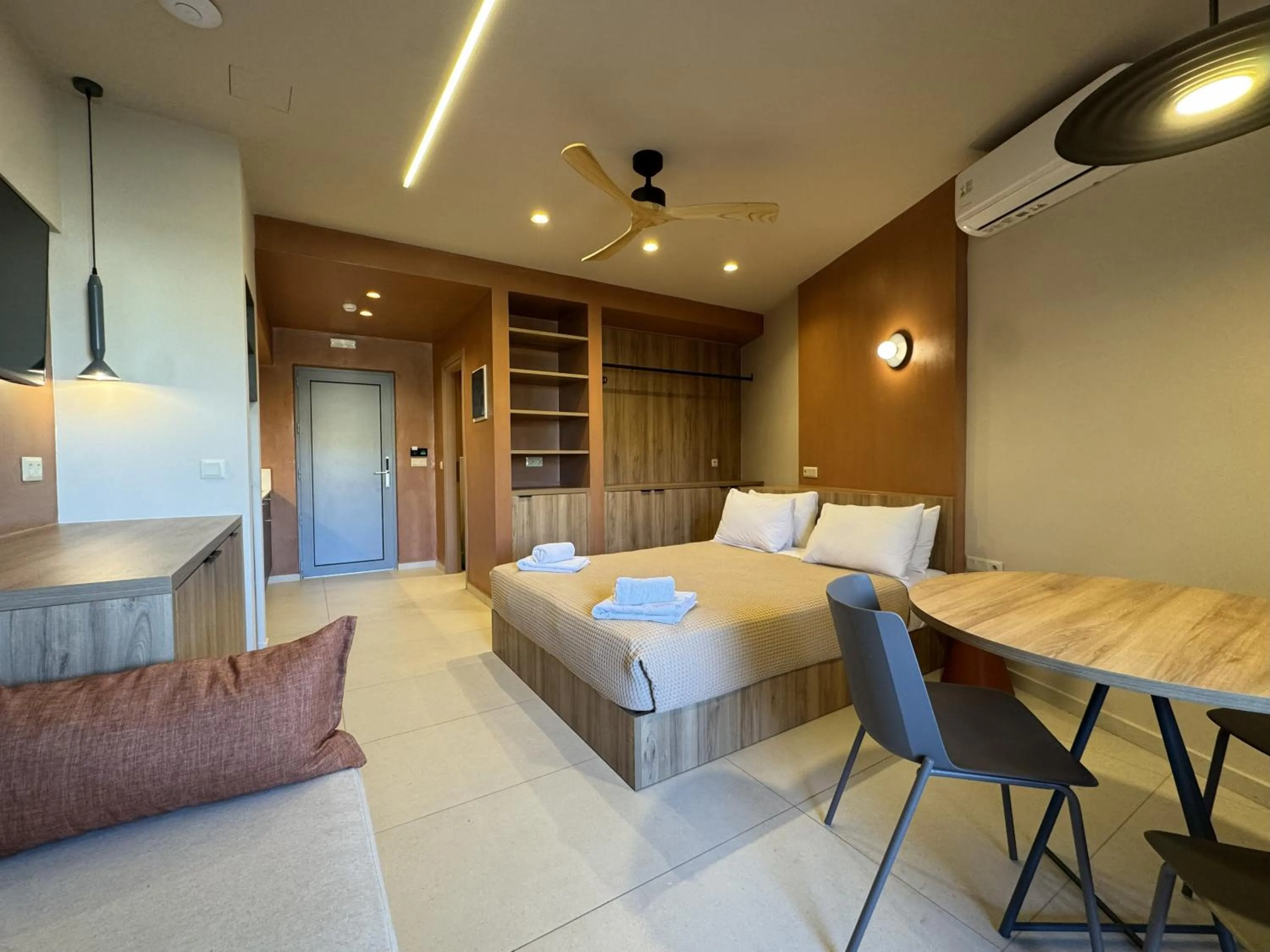 Bed in Philoxenia Apartments