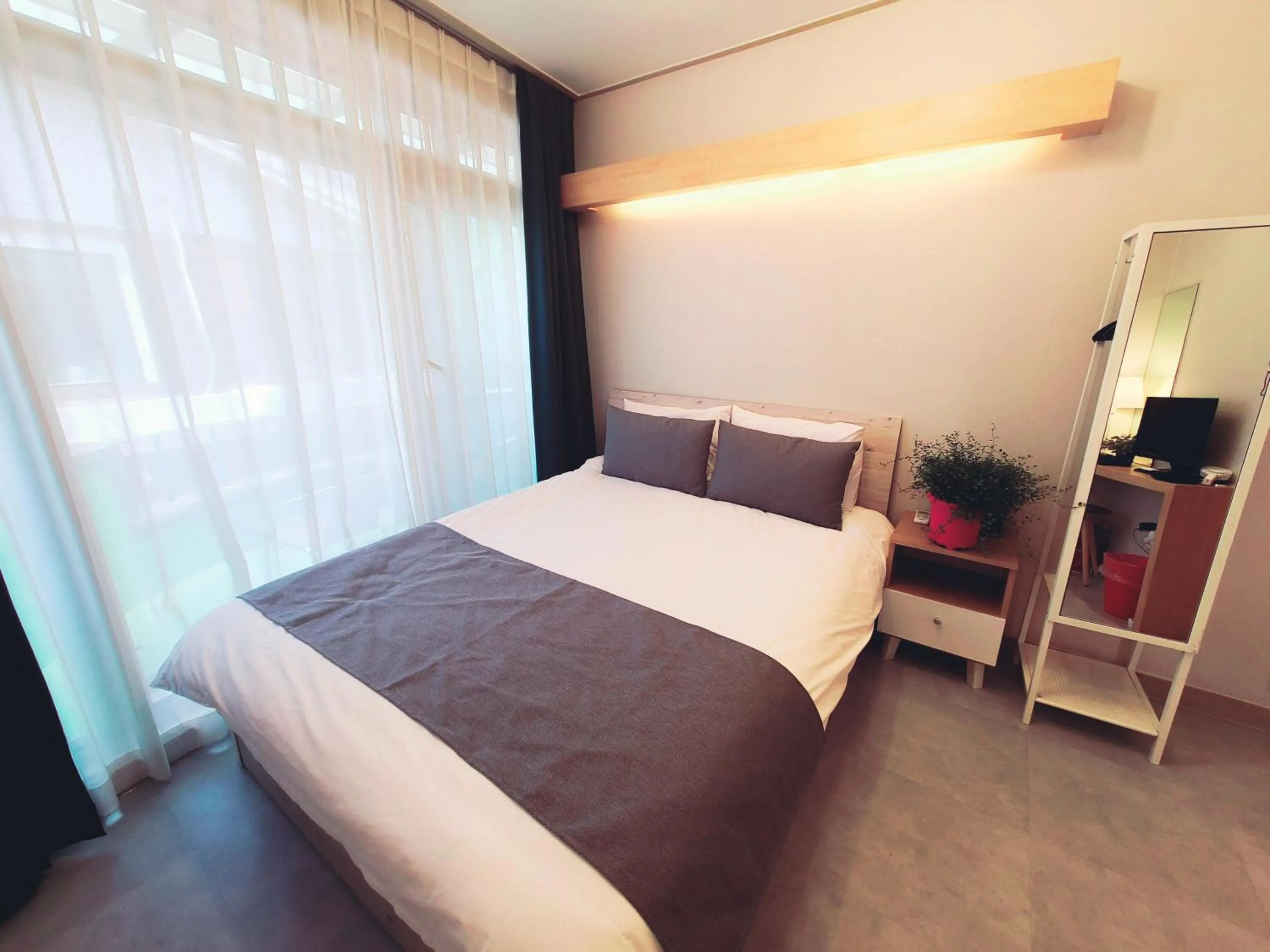 Bed in DW Design Residence