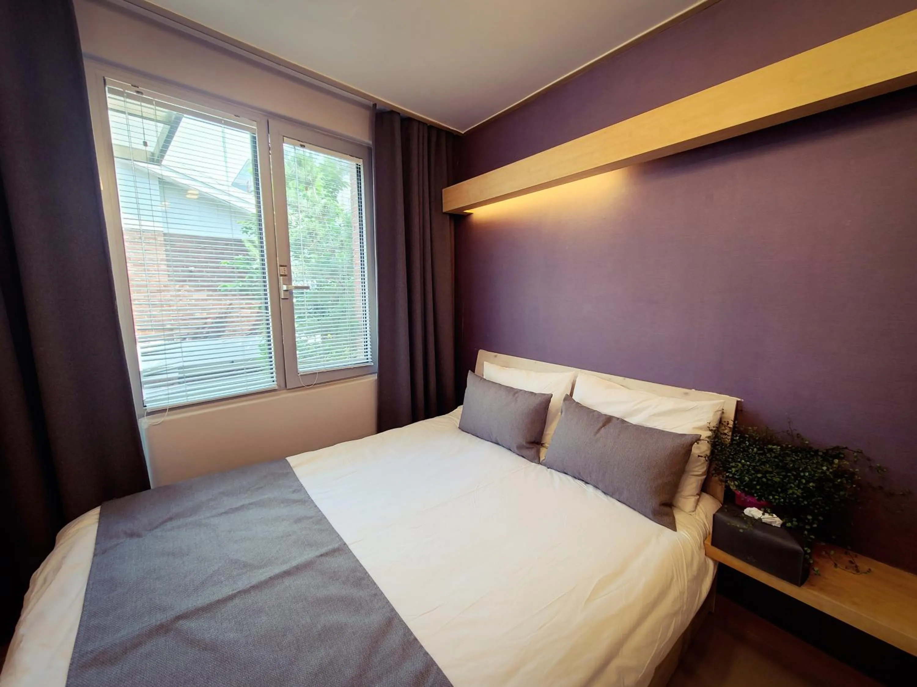 Bed in DW Design Residence