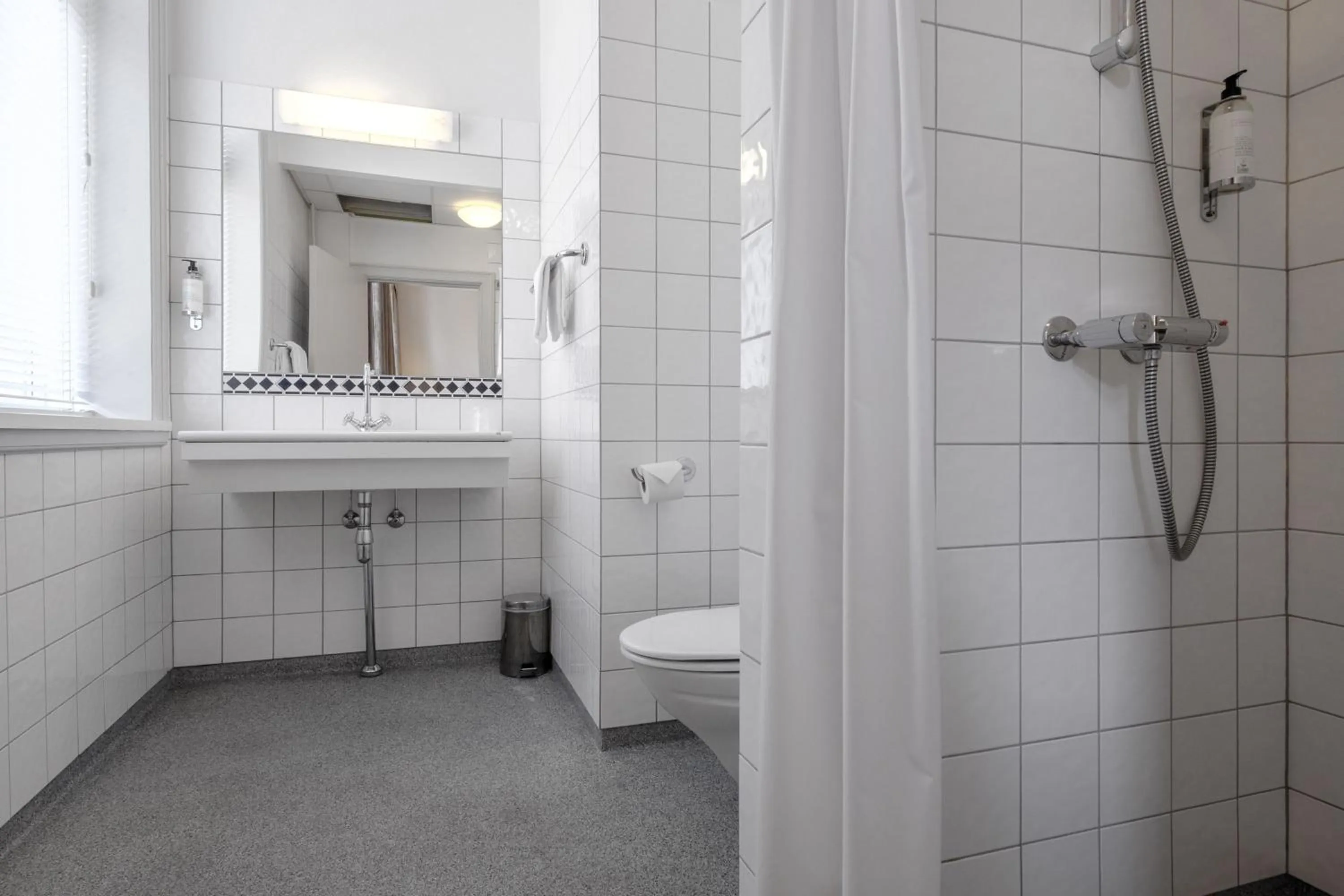 Bathroom in Four Points Flex by Sheraton Roskilde