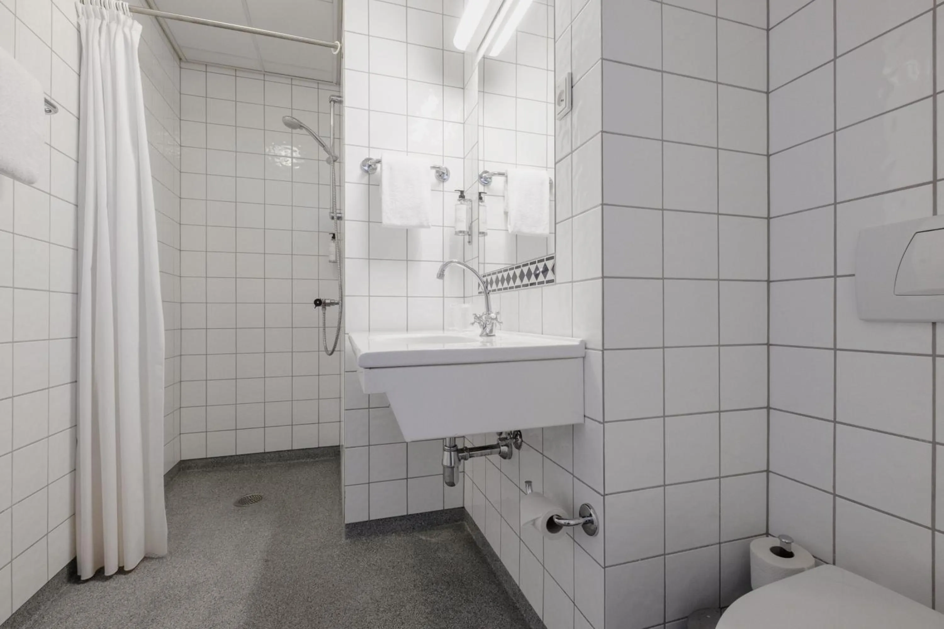 Bathroom in Four Points Flex by Sheraton Roskilde