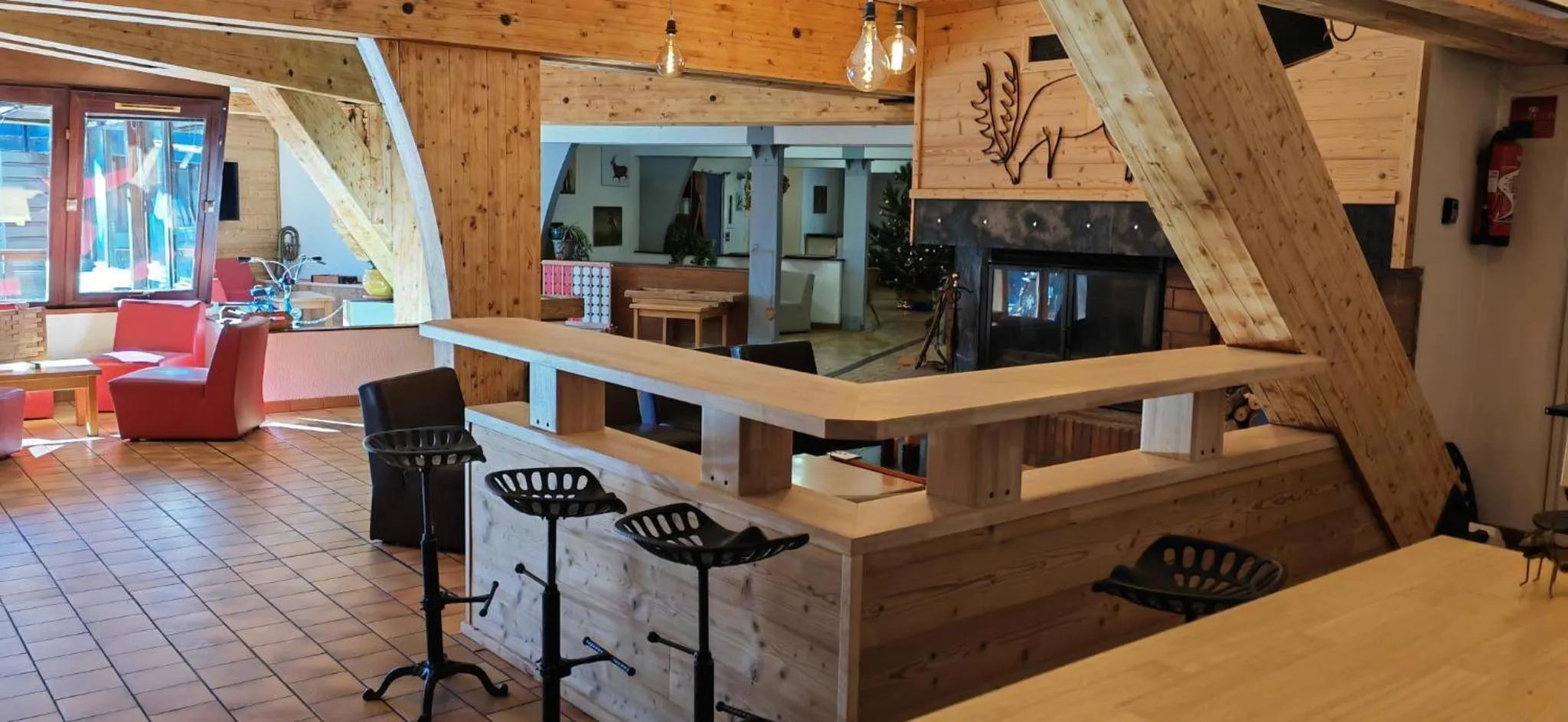 Lounge or bar in Le Chalet du Ticou