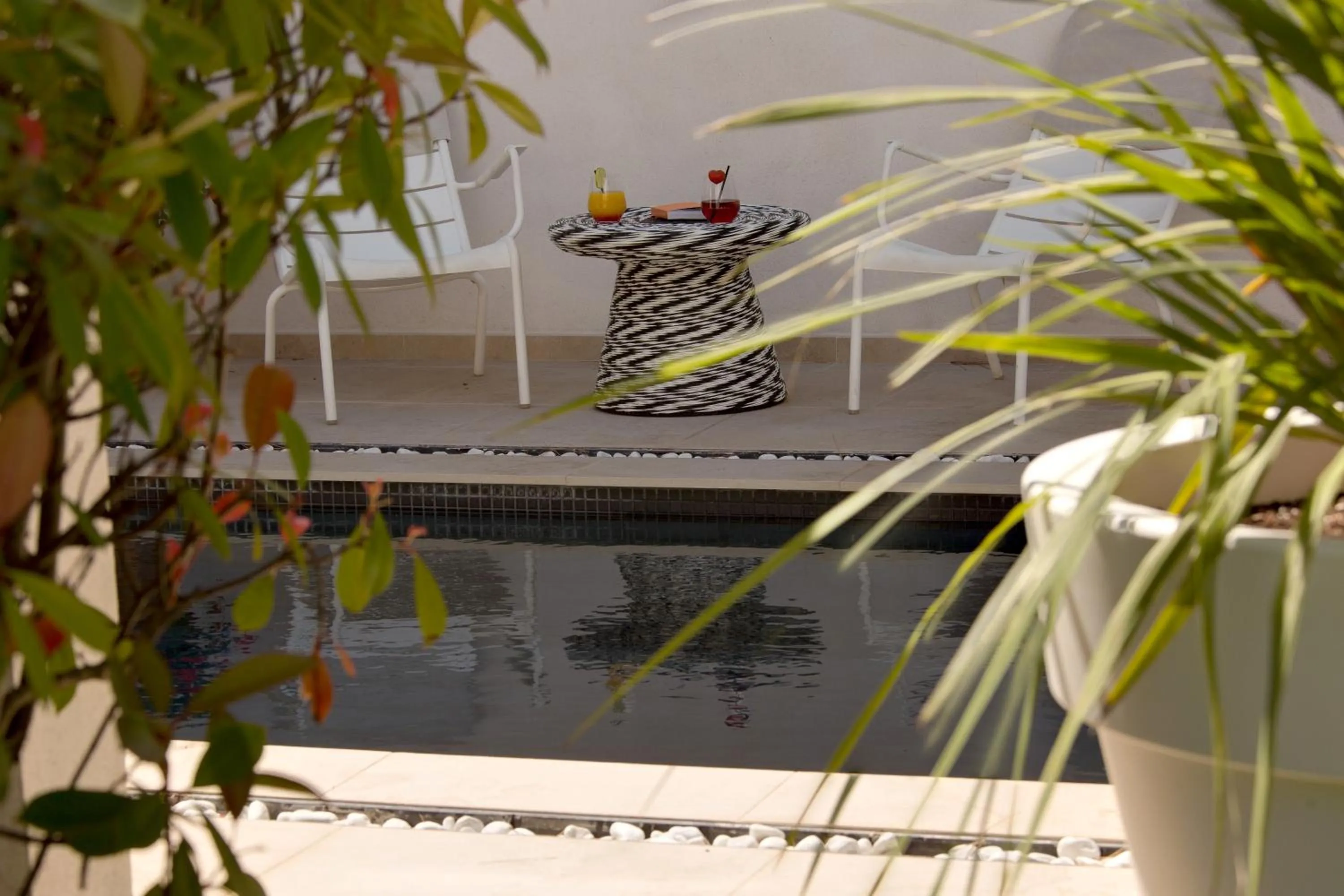 Swimming pool in Oustau Camarguen Hôtel & Spa