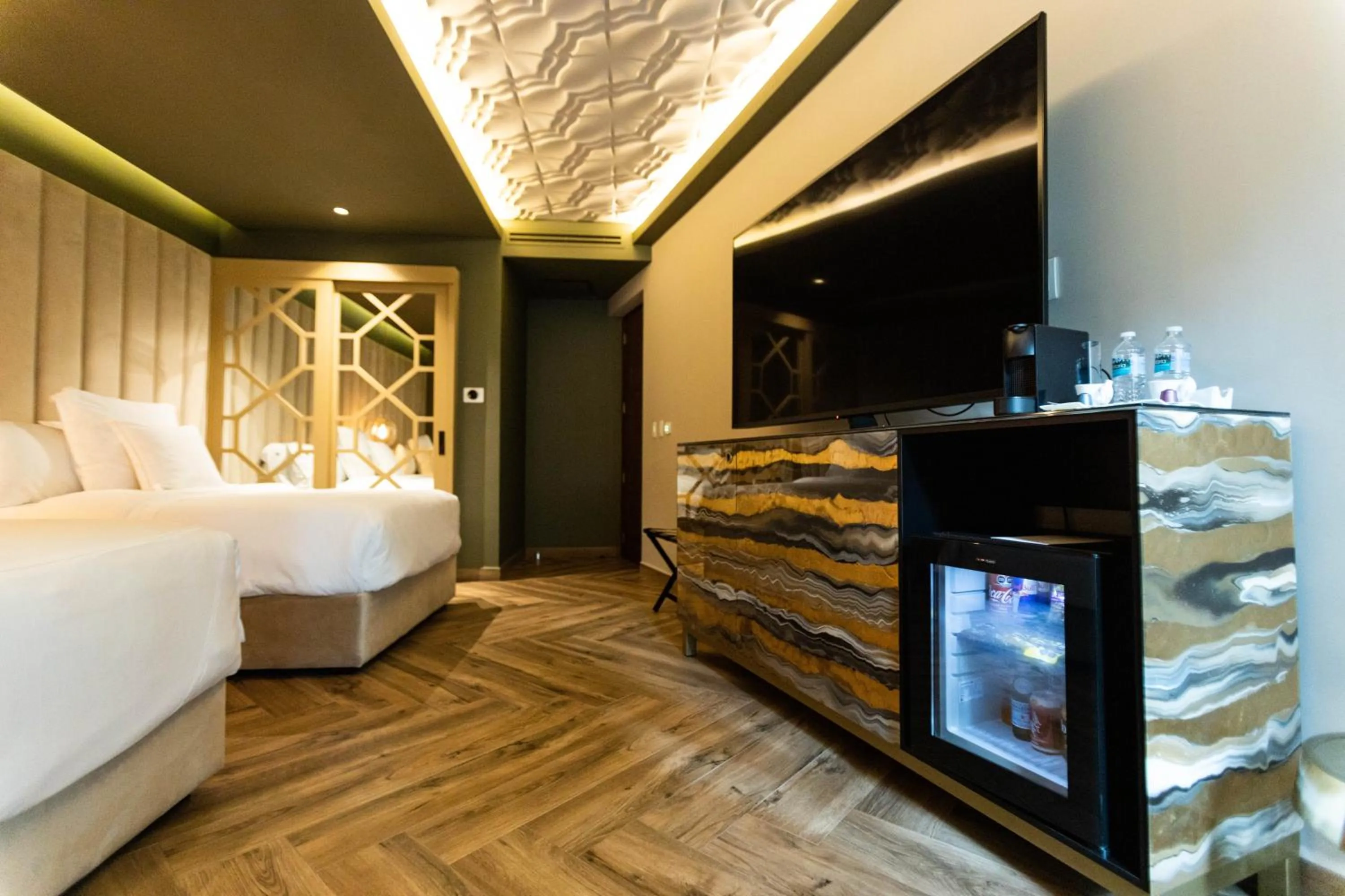 Bed in L Hotel Perla Boutique