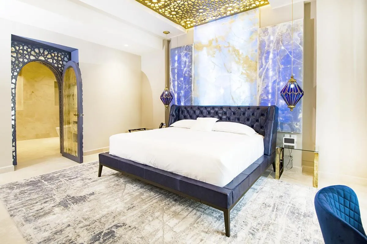 Bed in L Hotel Perla Boutique