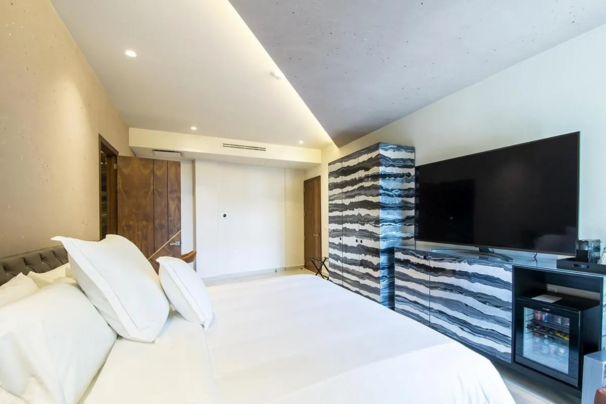 Bed in L Hotel Perla Boutique