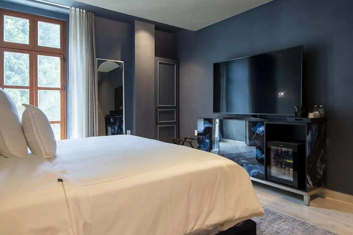 Bed in L Hotel Perla Boutique