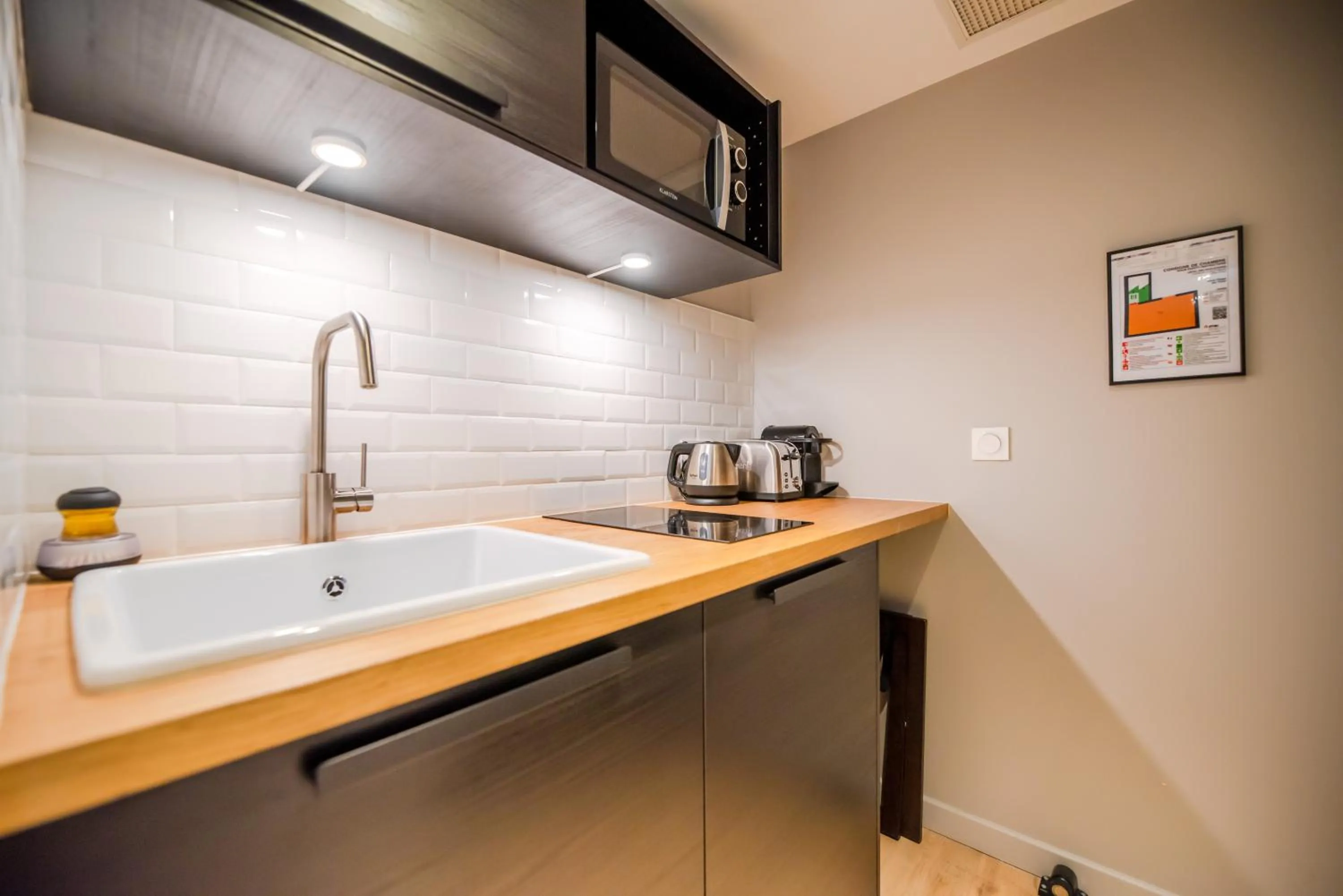 Kitchen or kitchenette in Residence Les Boulevards