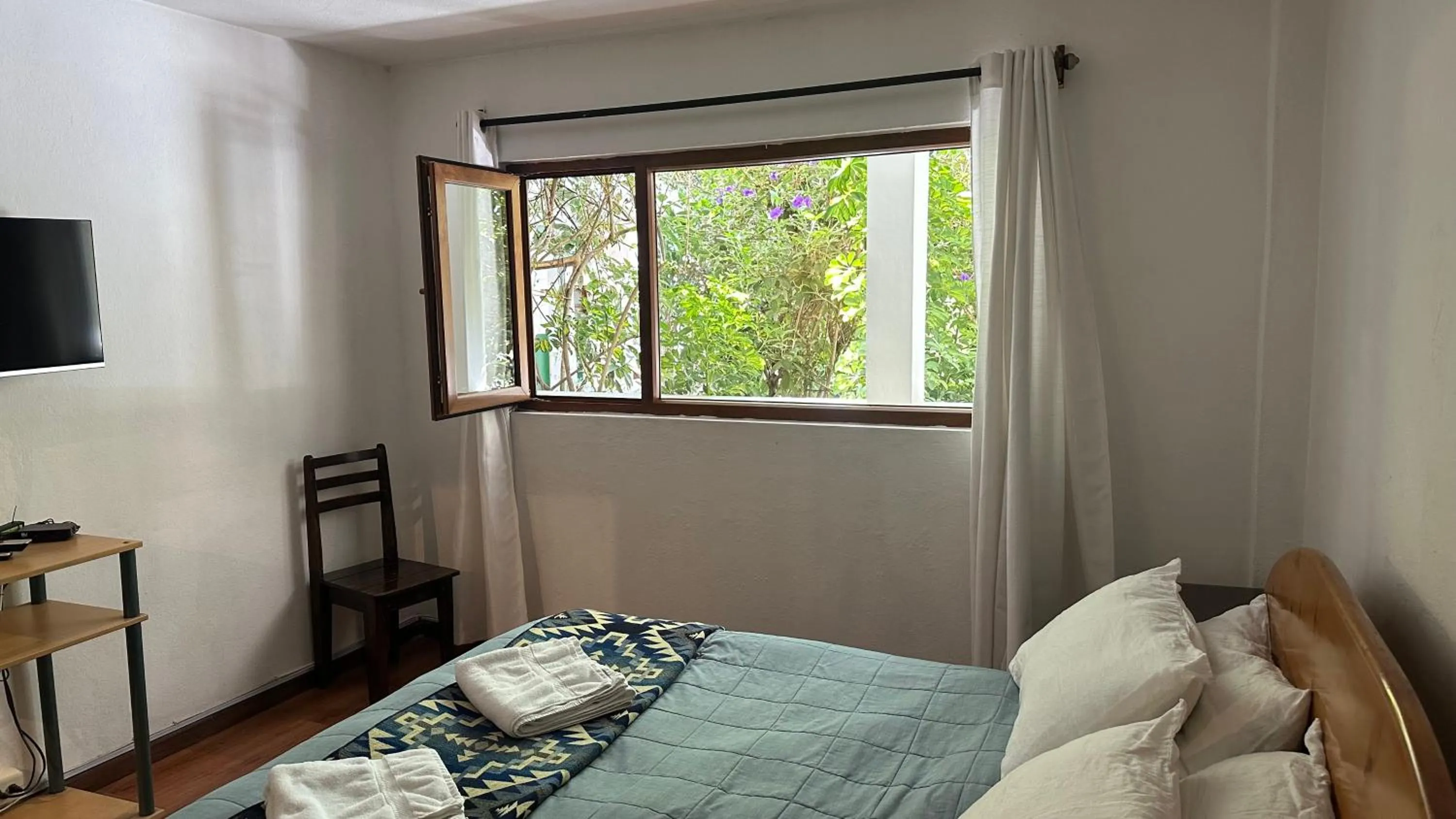 Bedroom, Bed in Apartamentos Otorongo Cuenca Ecuador