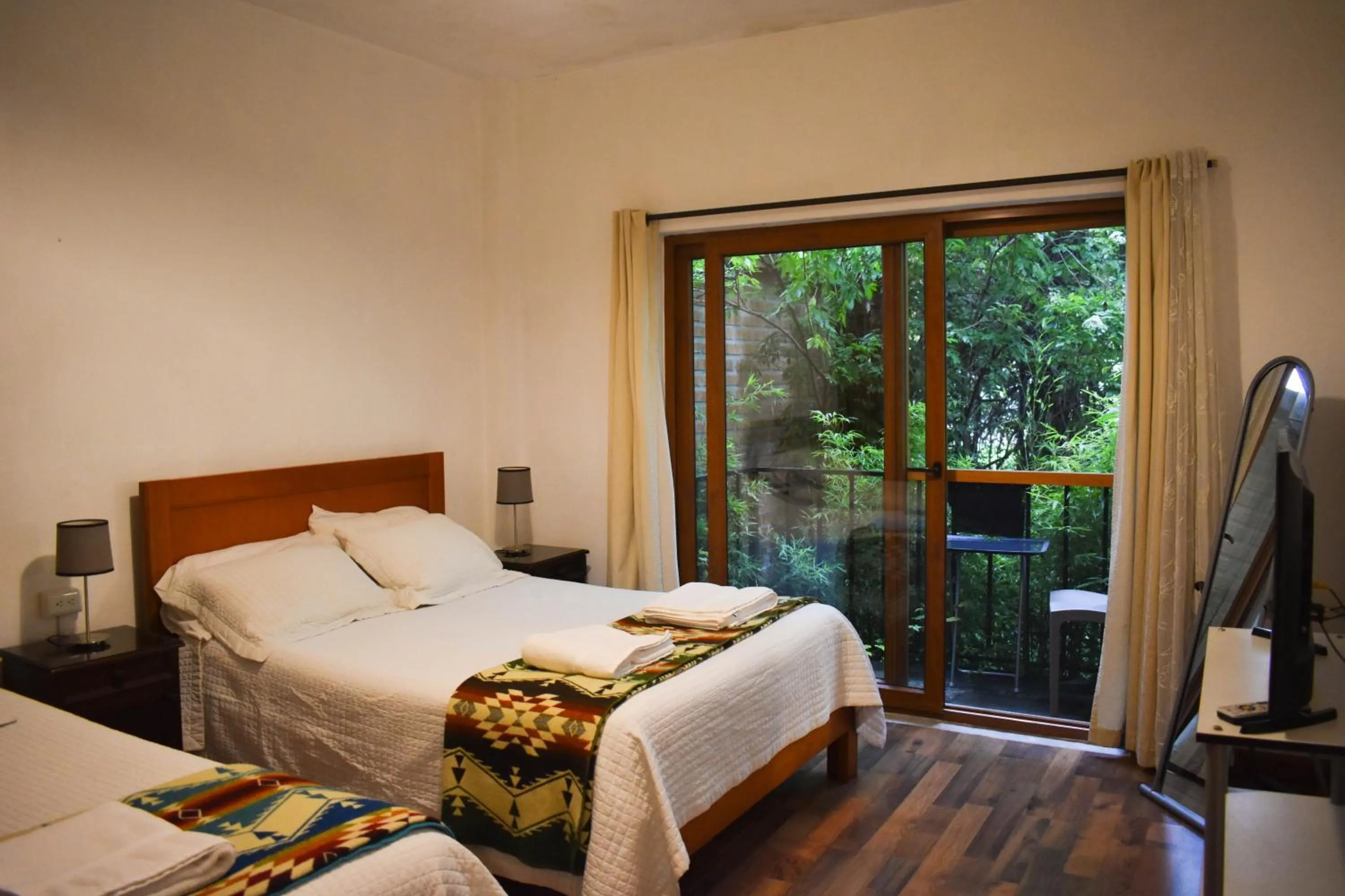 Bedroom, Bed in Apartamentos Otorongo Cuenca Ecuador