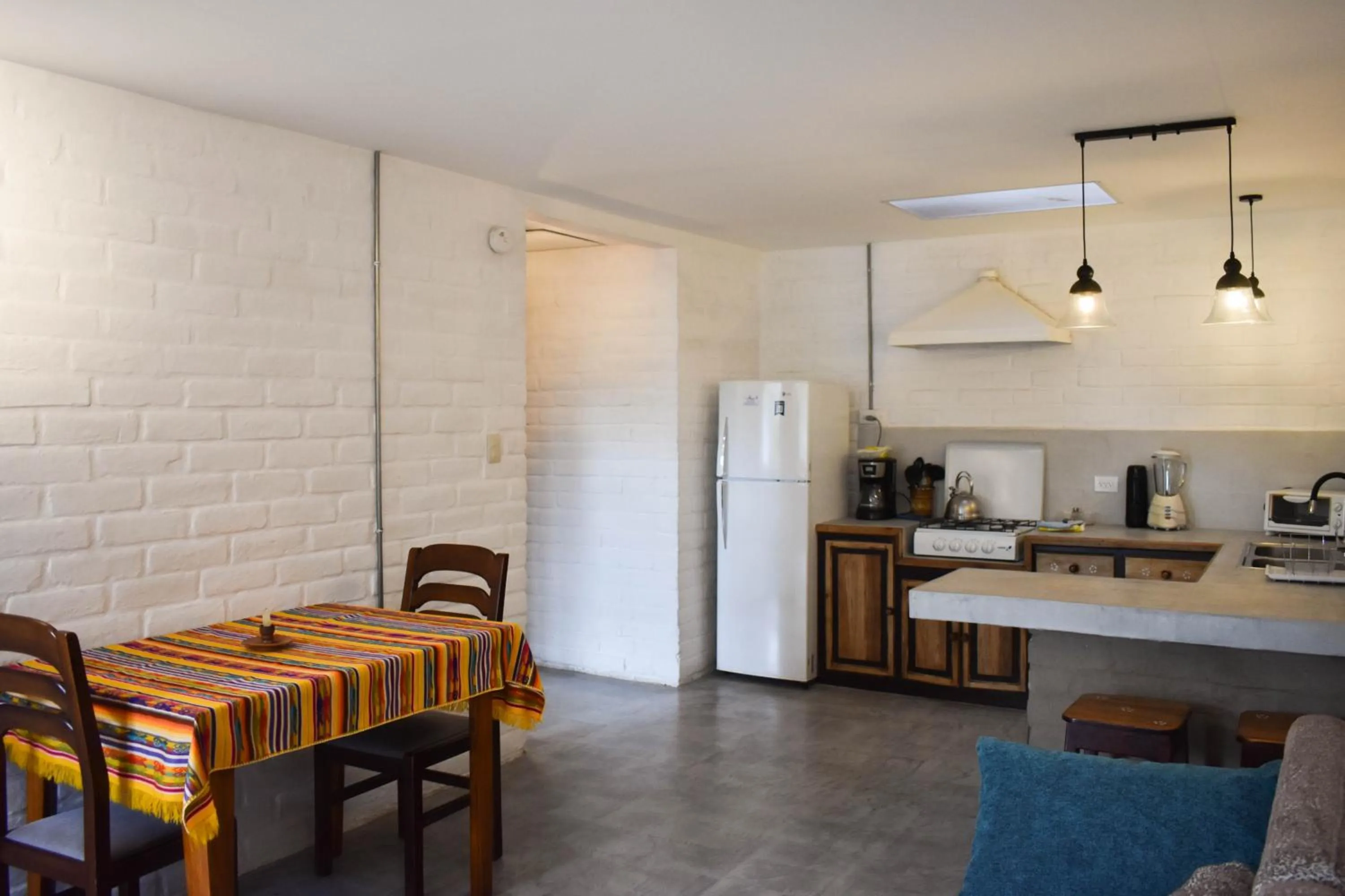 Kitchen or kitchenette in Apartamentos Otorongo Cuenca Ecuador