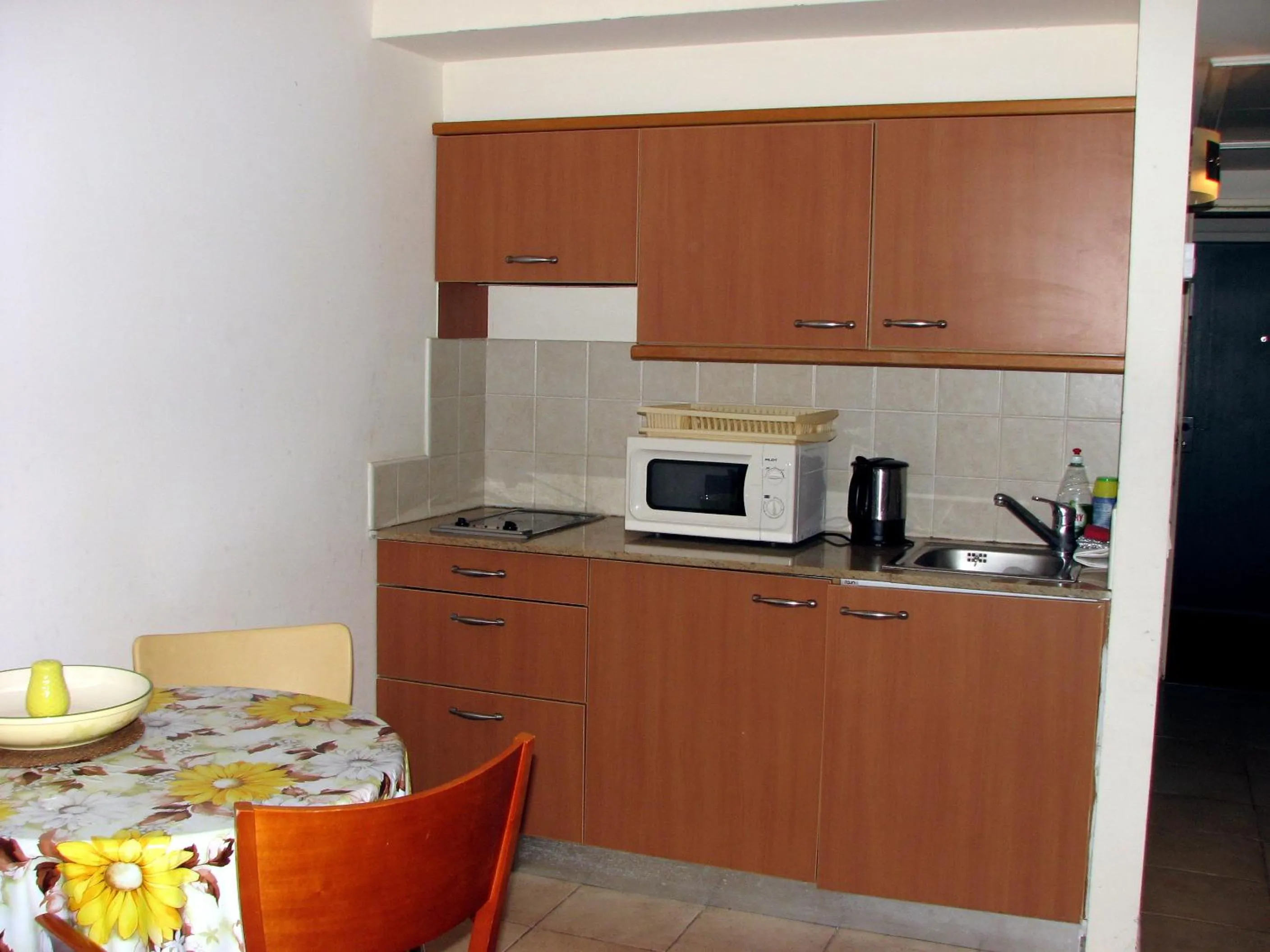 Kitchen or kitchenette in Apartments on the Beach