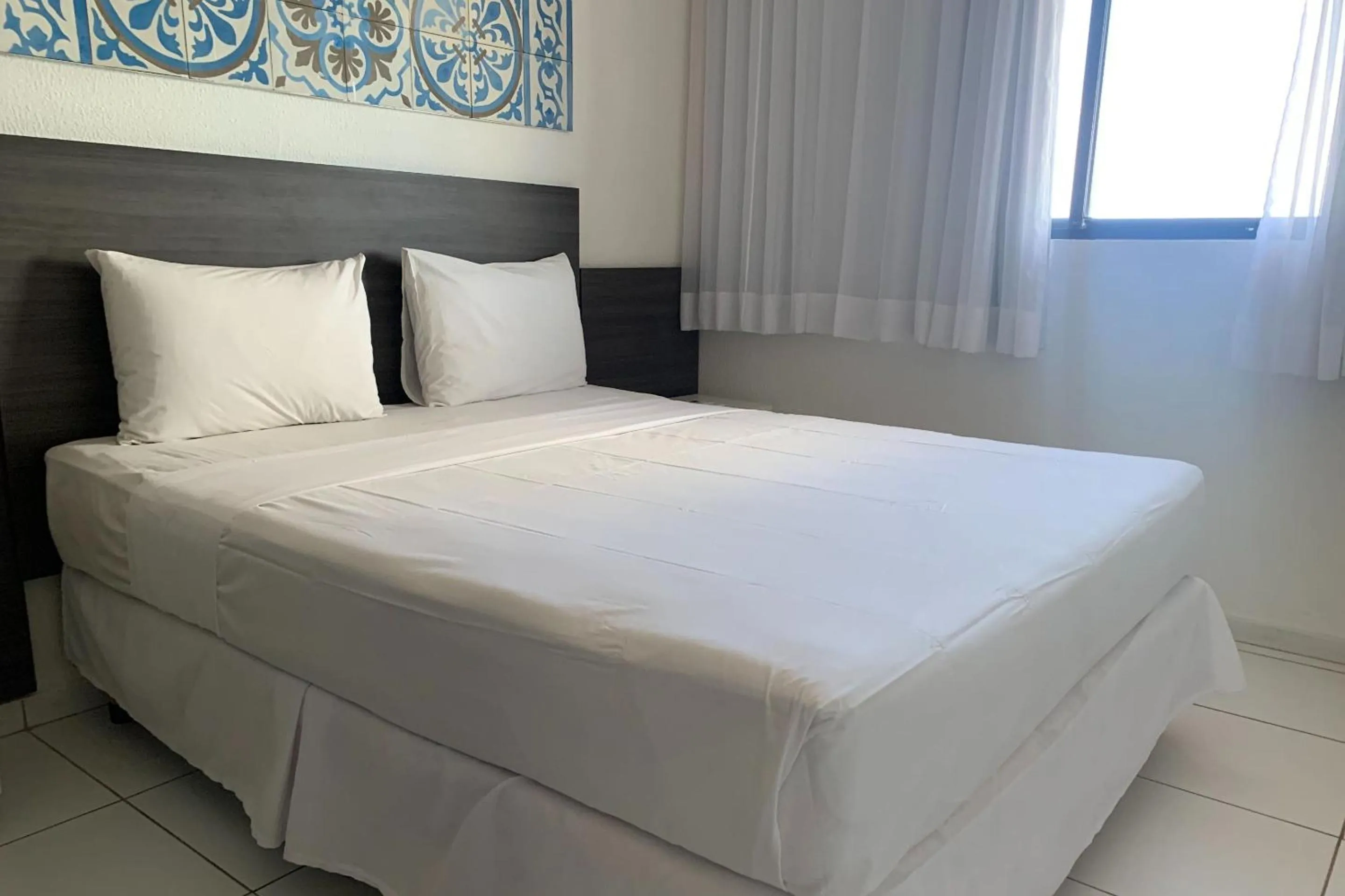 Bed in Atlântico Hotel Maceió