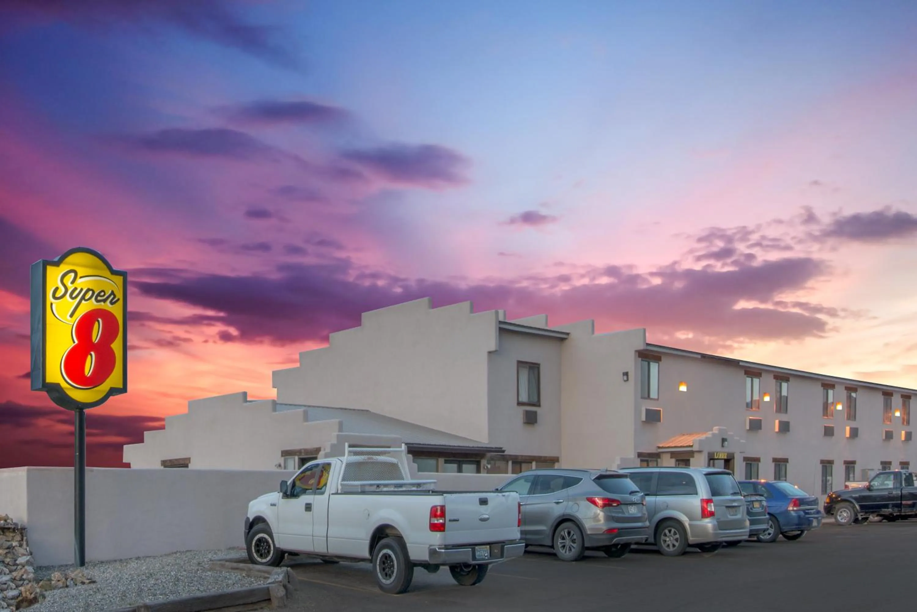 Property logo or sign in Super 8 by Wyndham Taos