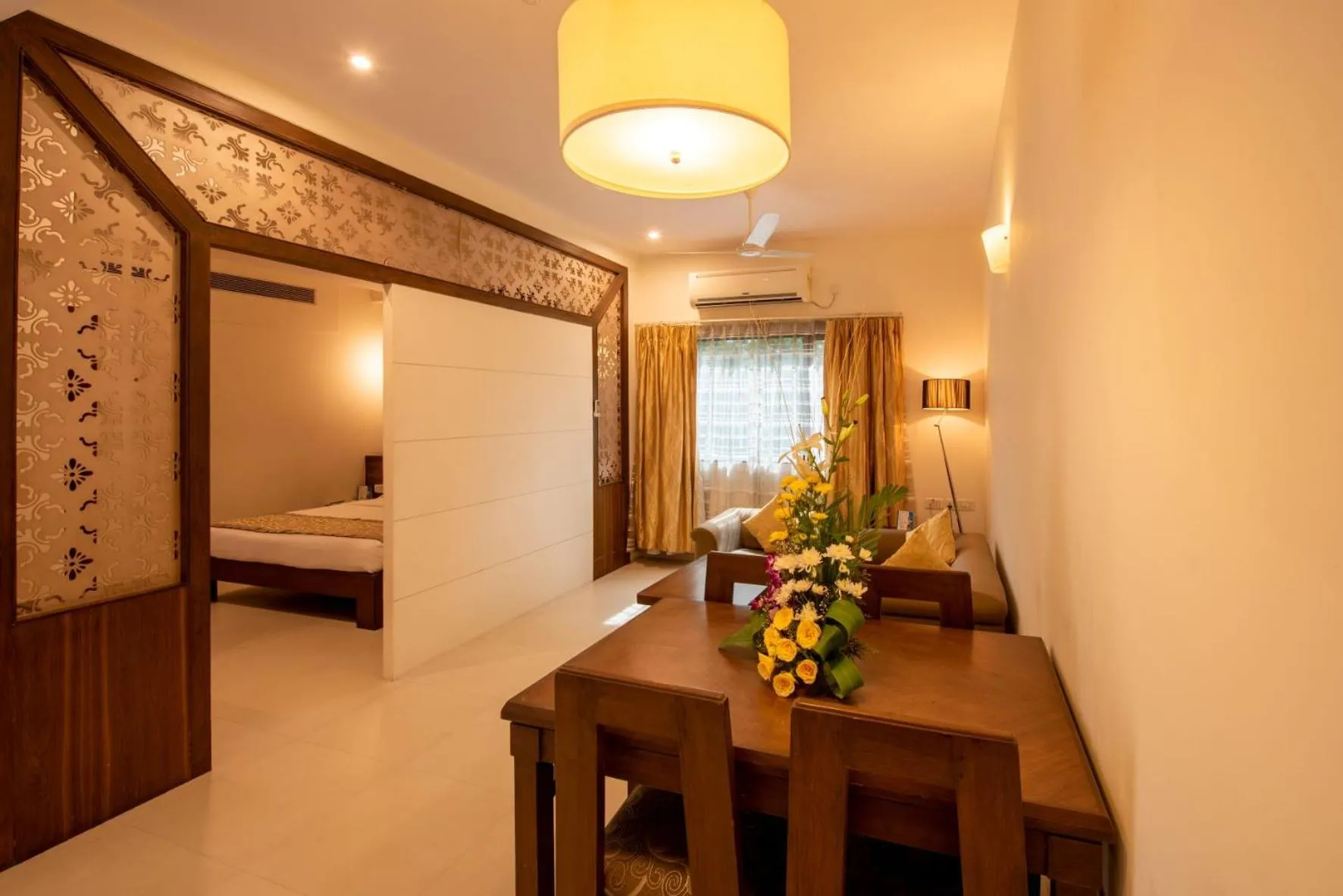 Living room, Bed in La-Paz Gardens Beacon Hotel - Vasco da Gama Goa