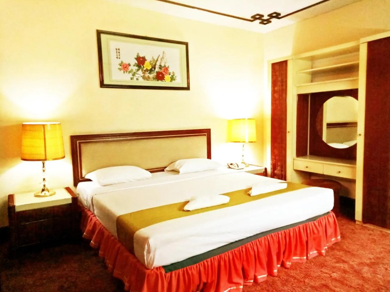 Bed in New Grand Park Hotel