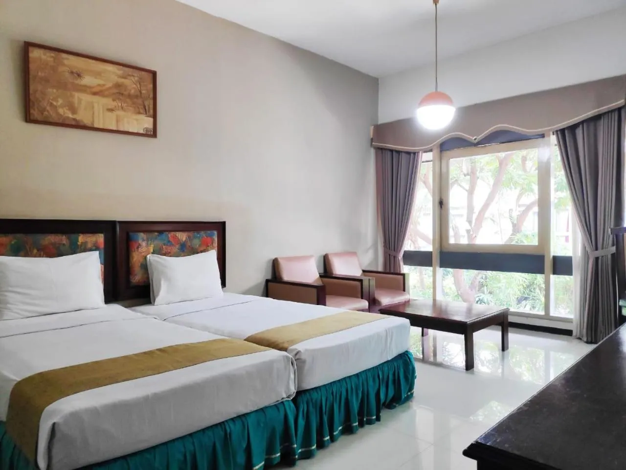 Bed in New Grand Park Hotel