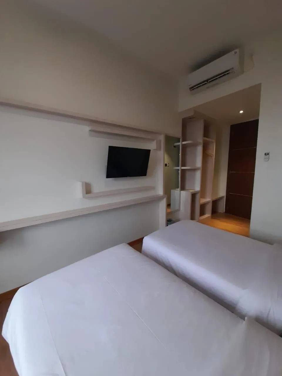 Bed in Blitz Hotel Batam Centre