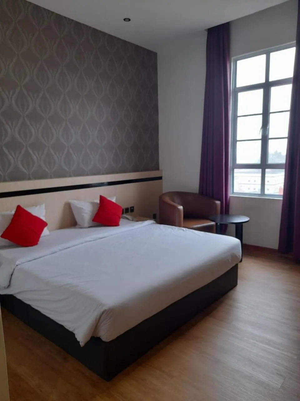 Bed in Blitz Hotel Batam Centre