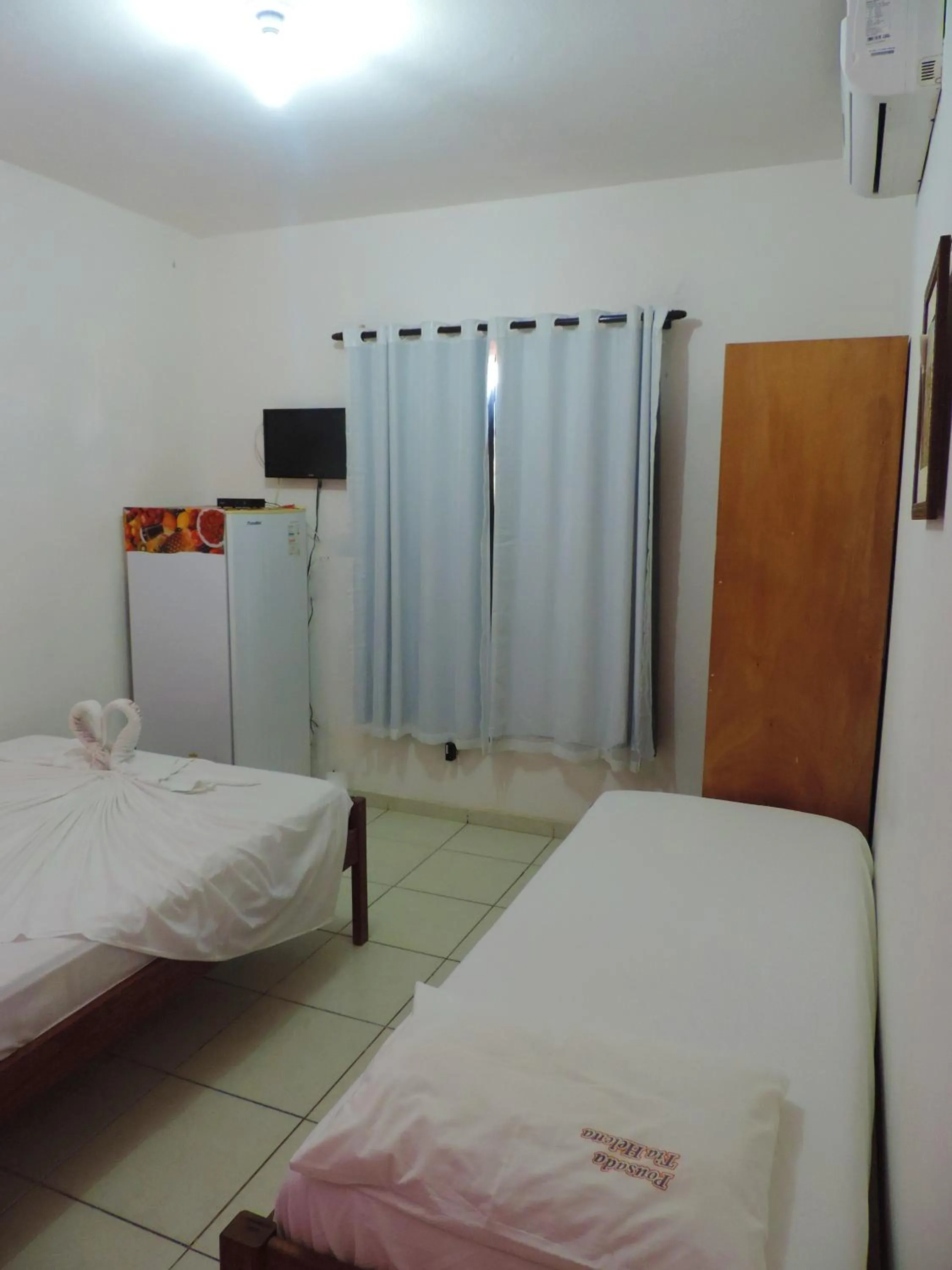 Bed in Pousada Tia Helena