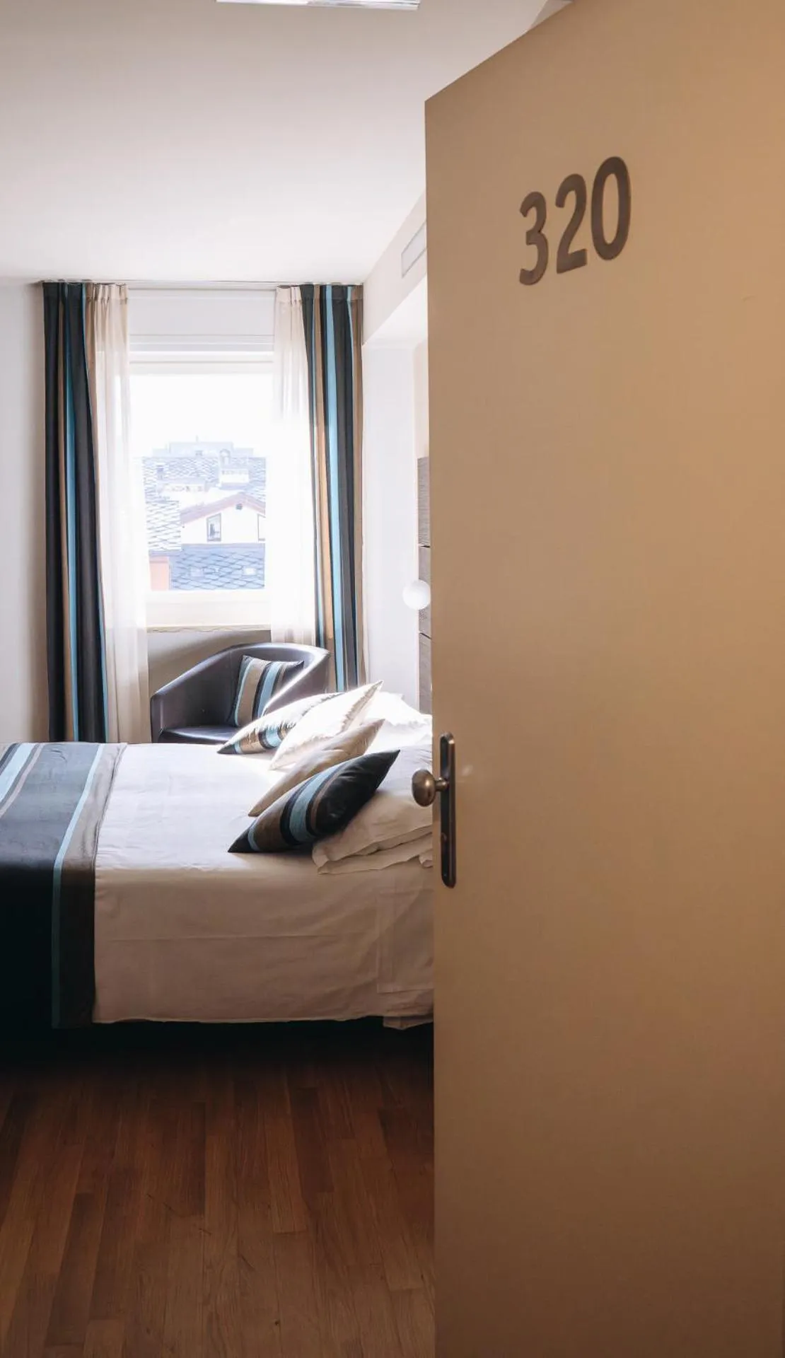 Bedroom, Bed in HB Aosta Hotel & Balcony SPA