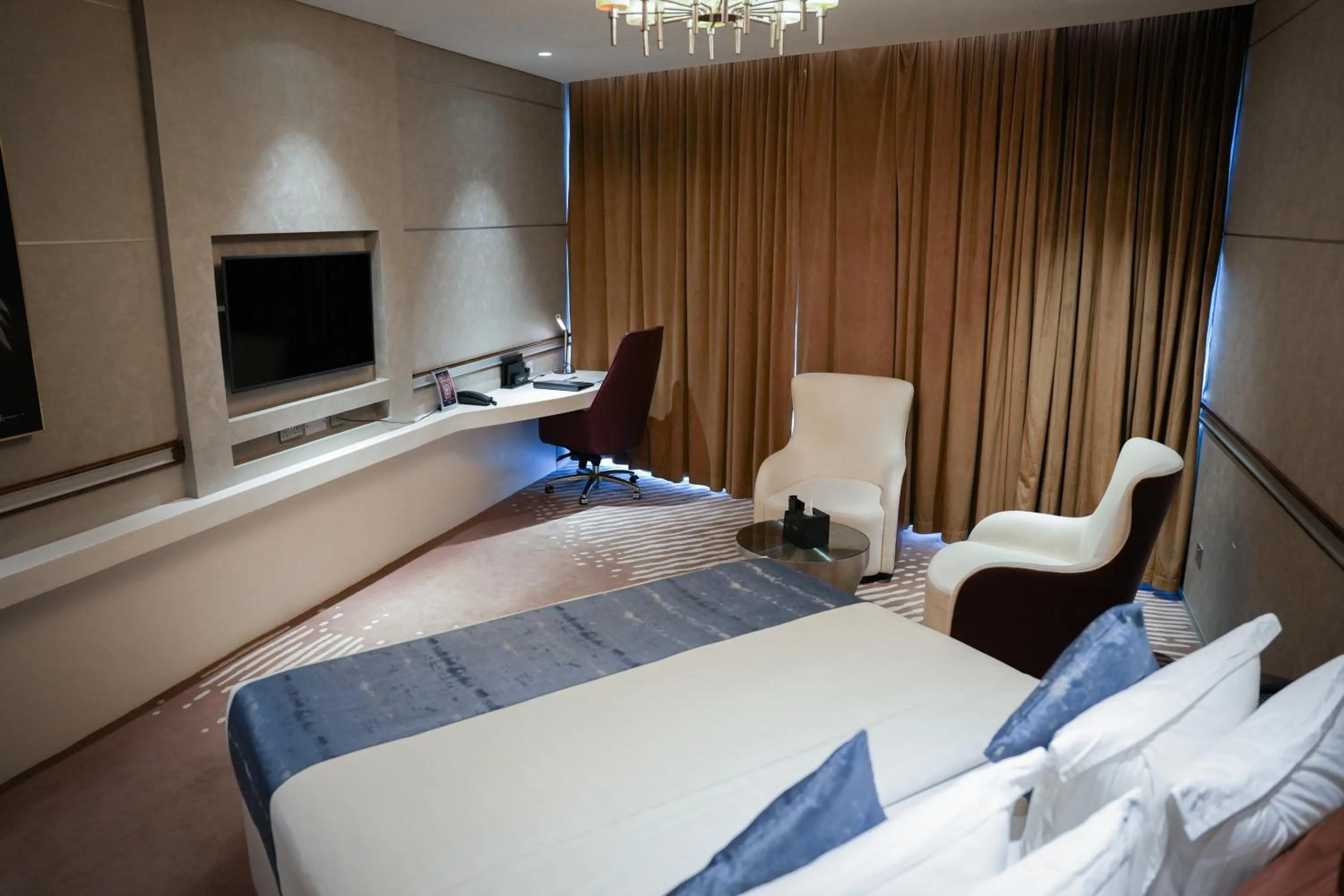 Seating area, Bed in VIP Hotel Doha Qatar