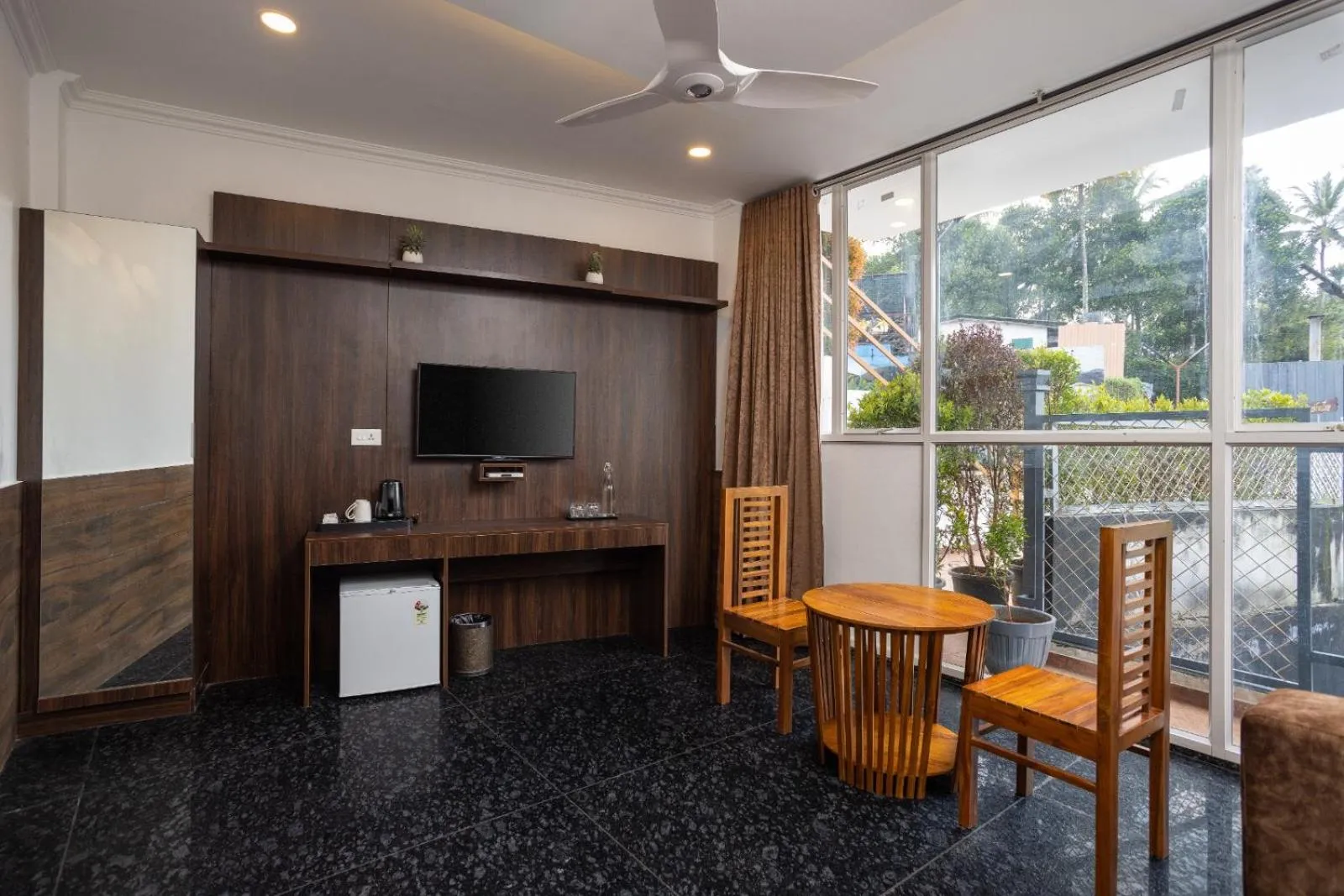 Communal lounge/ TV room in Star Emirates Luxury Resort and Spa, Munnar