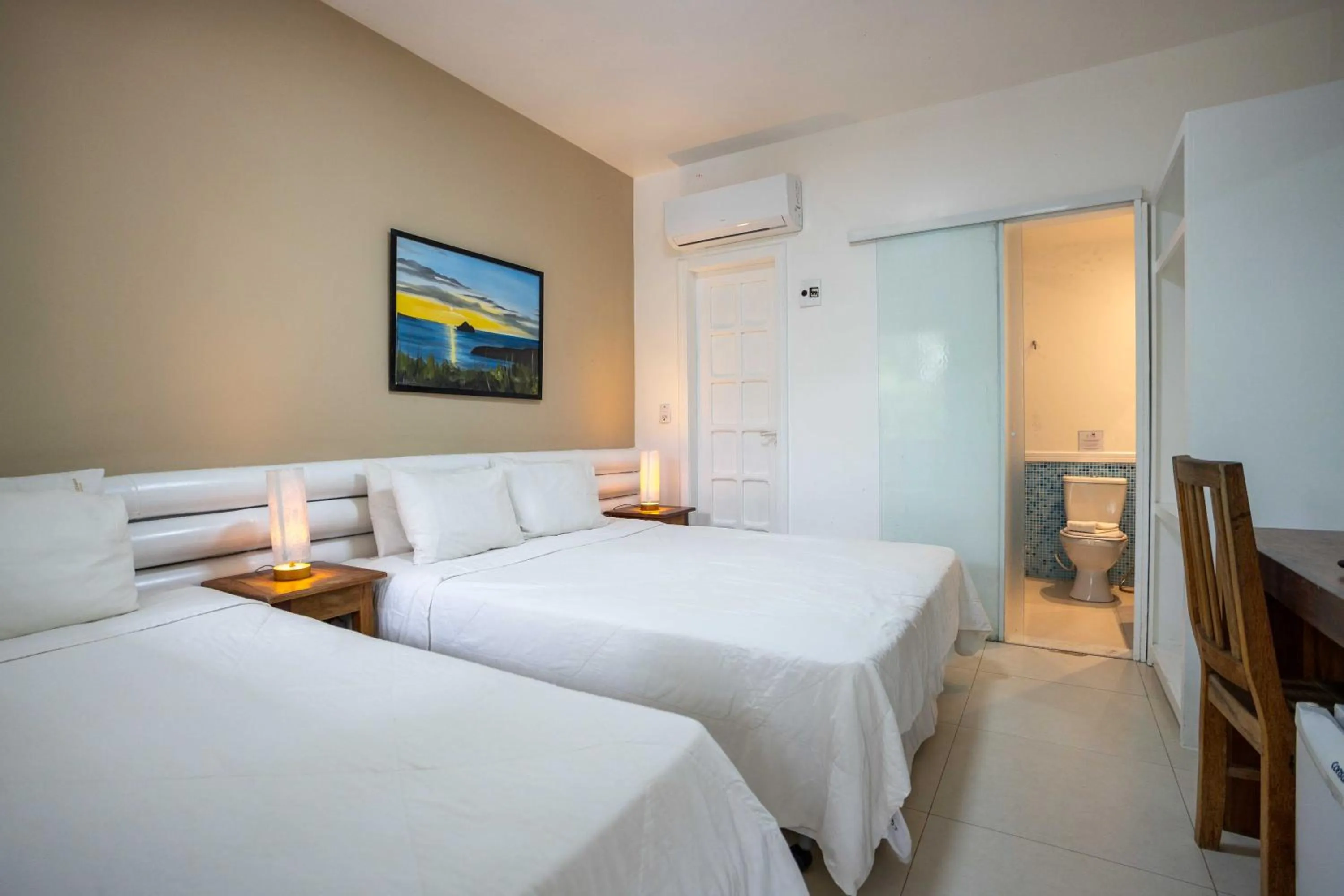 Bed in Pousada Vila Pitanga