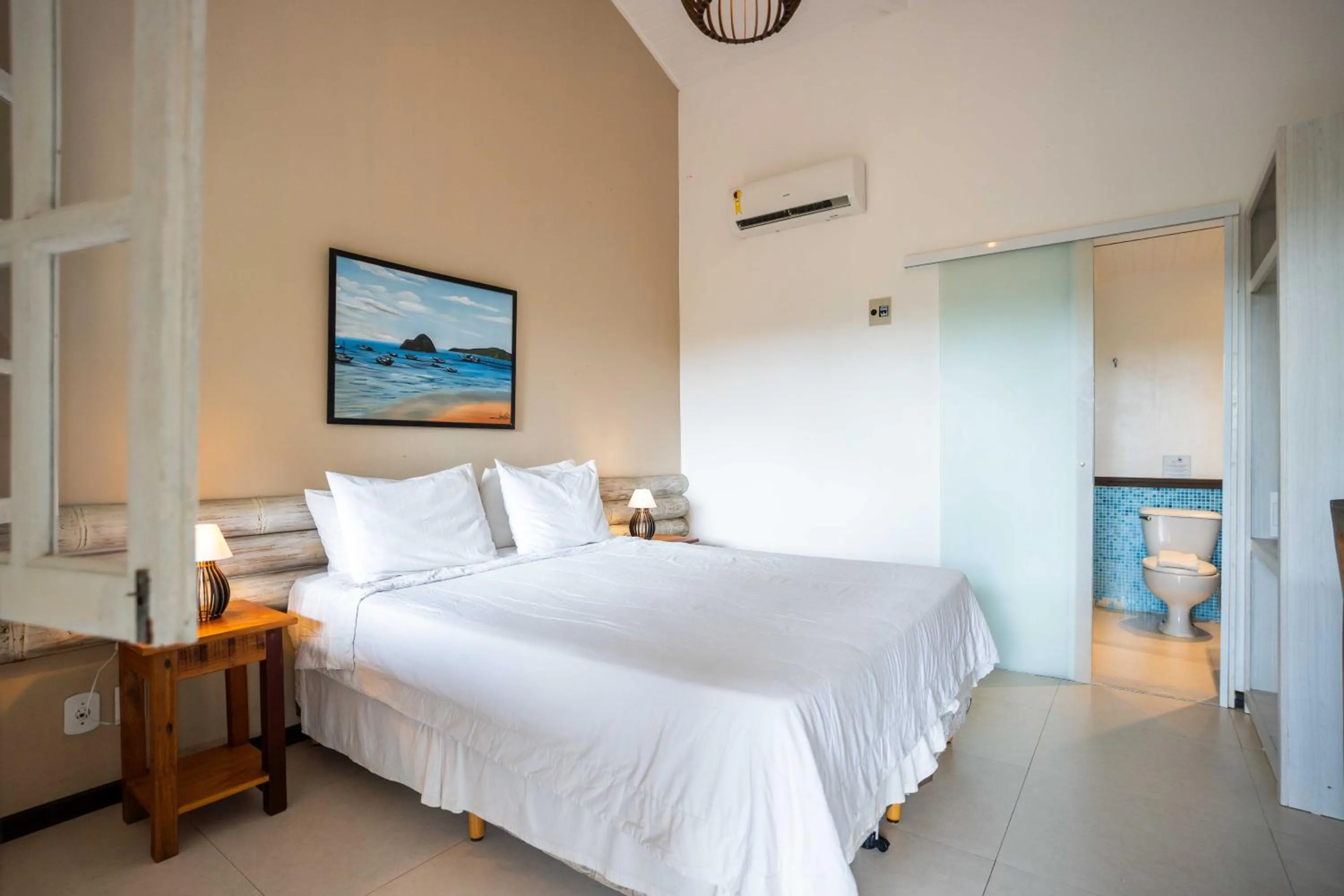 Bed in Pousada Vila Pitanga