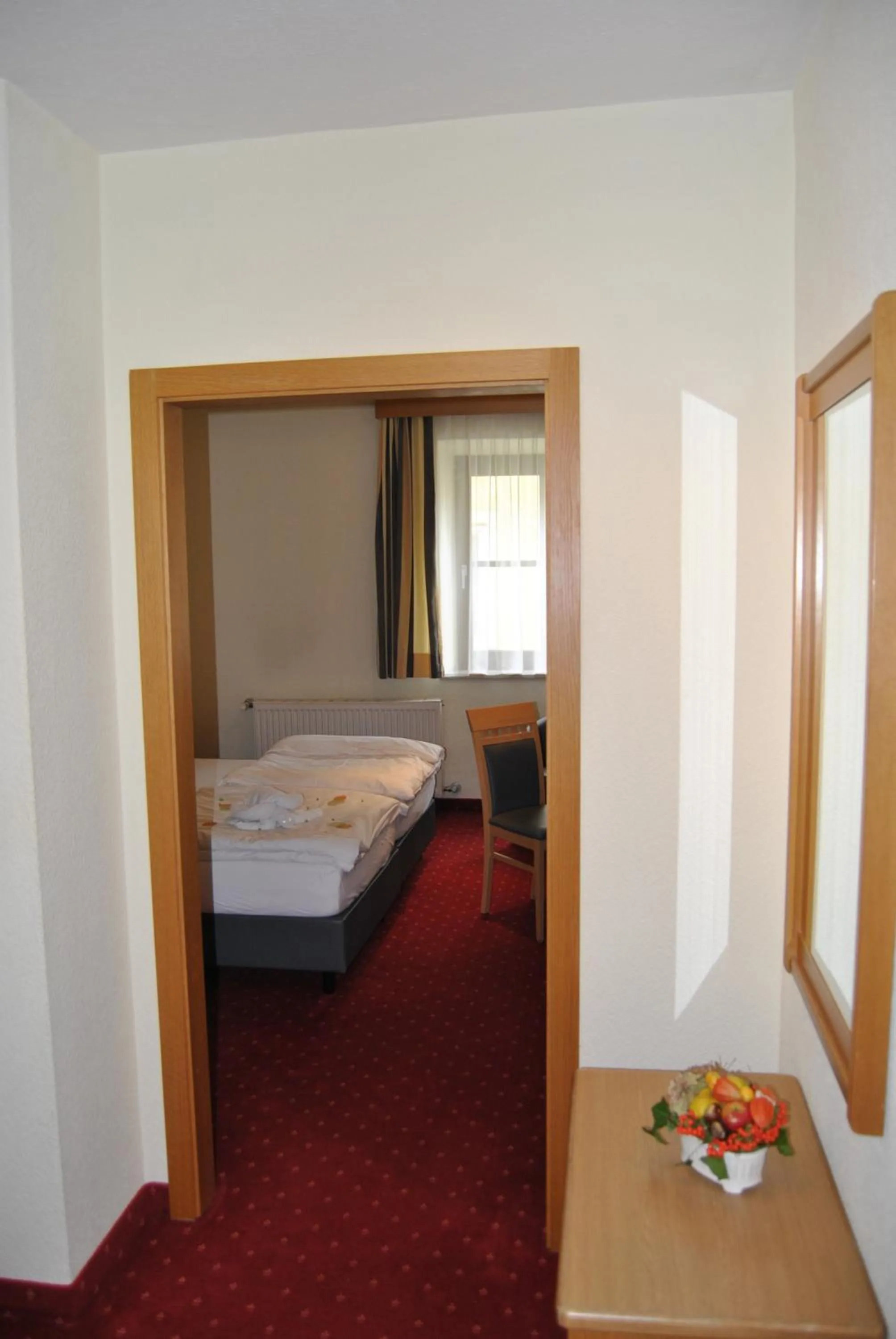 Decorative detail, Bed in Lodner Hotel Drei Mohren