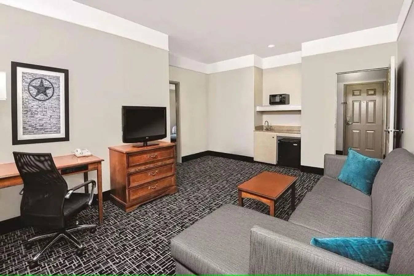 Living room in Vista Del Sol Hotel - Rosenberg