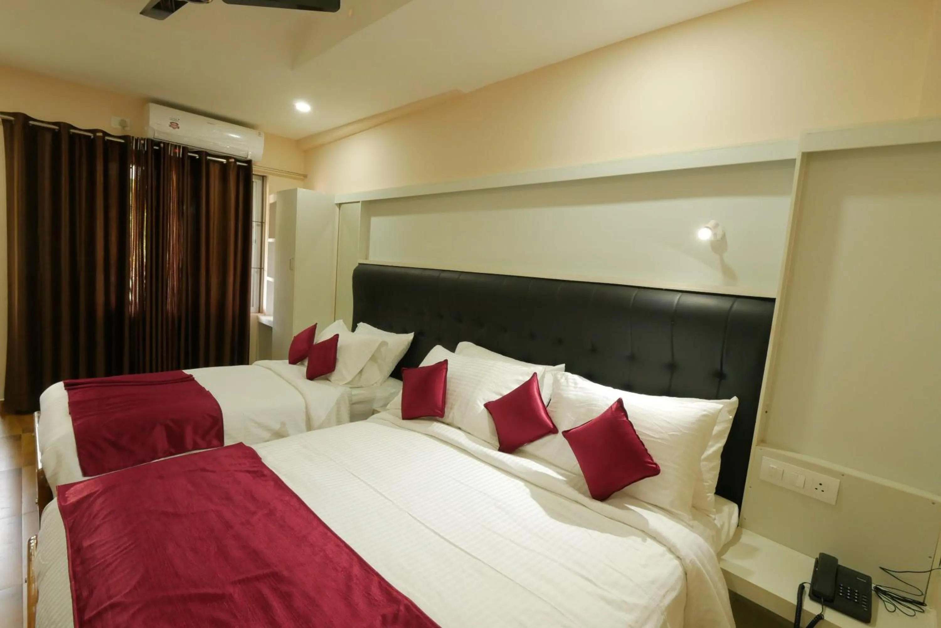 Photo of the whole room, Bed in Hotel Wayanad Square