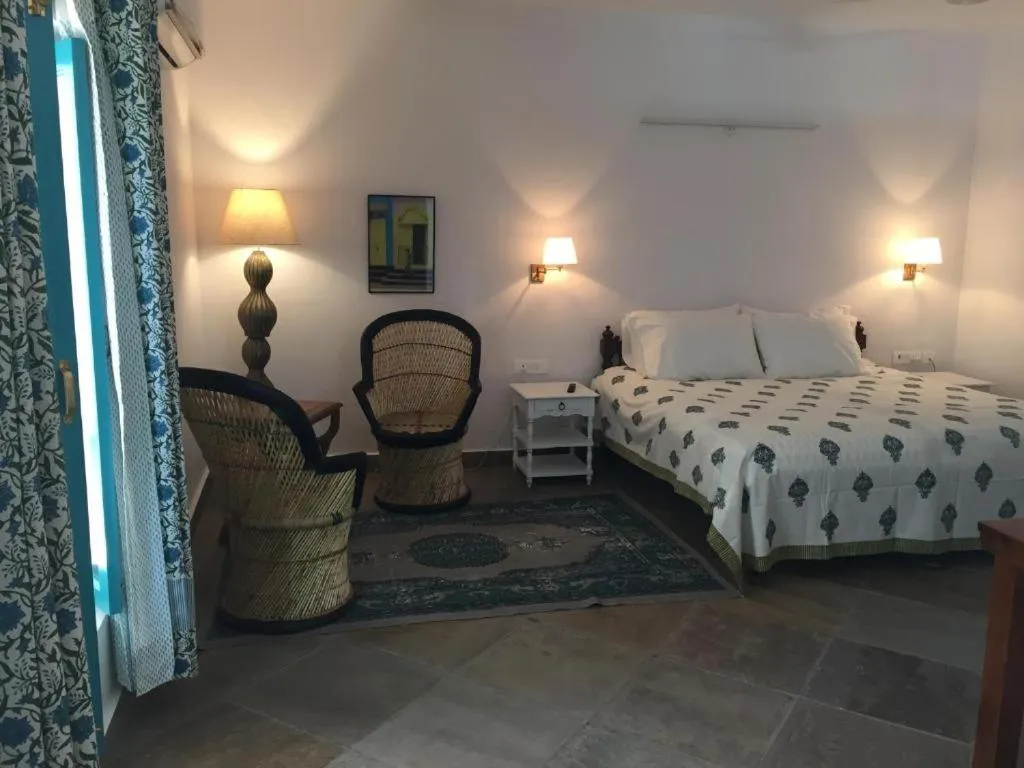 Bed in Mango Tree Courtyard Dehradun