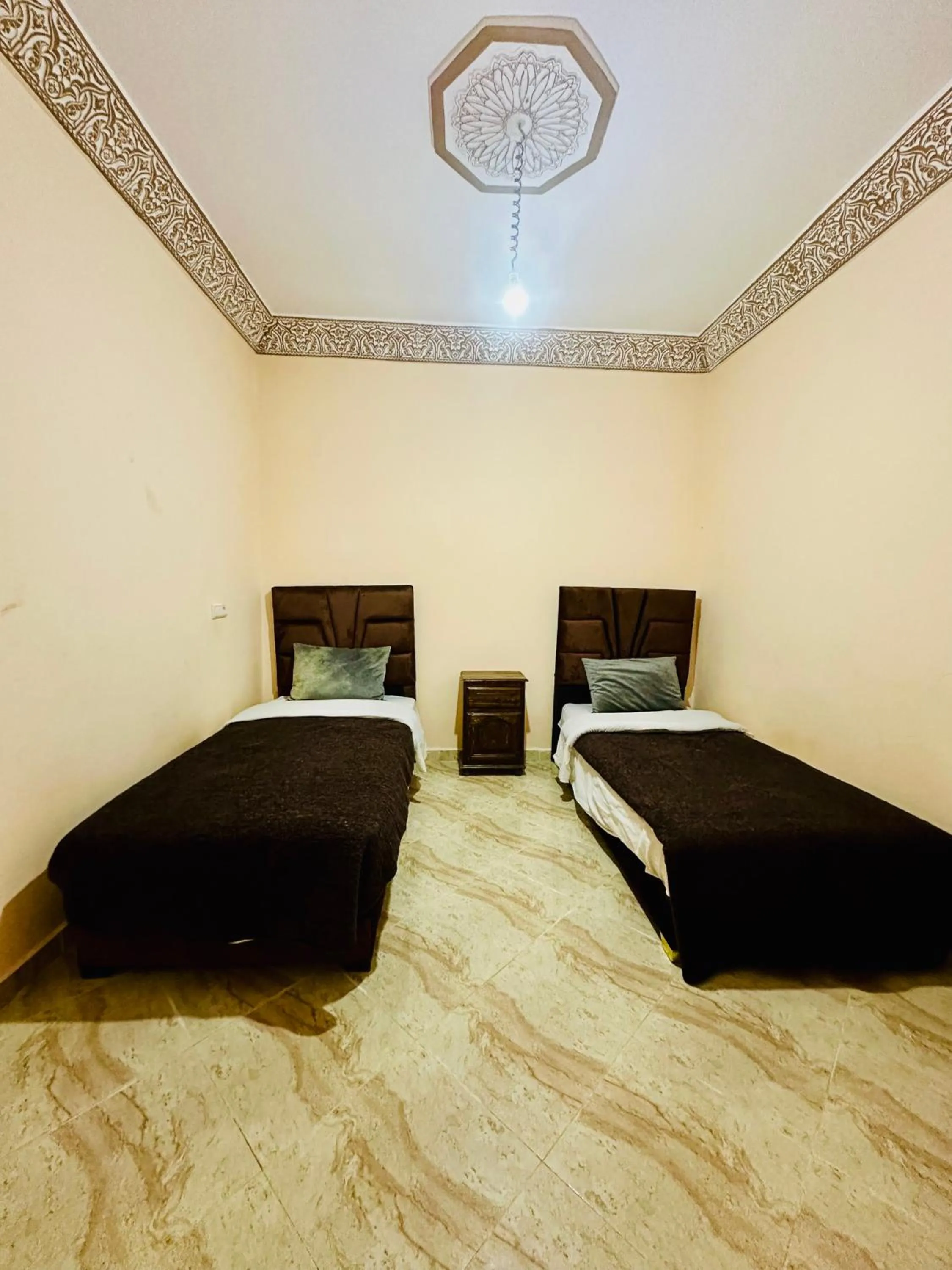 Bed in Merzouga desert apartment