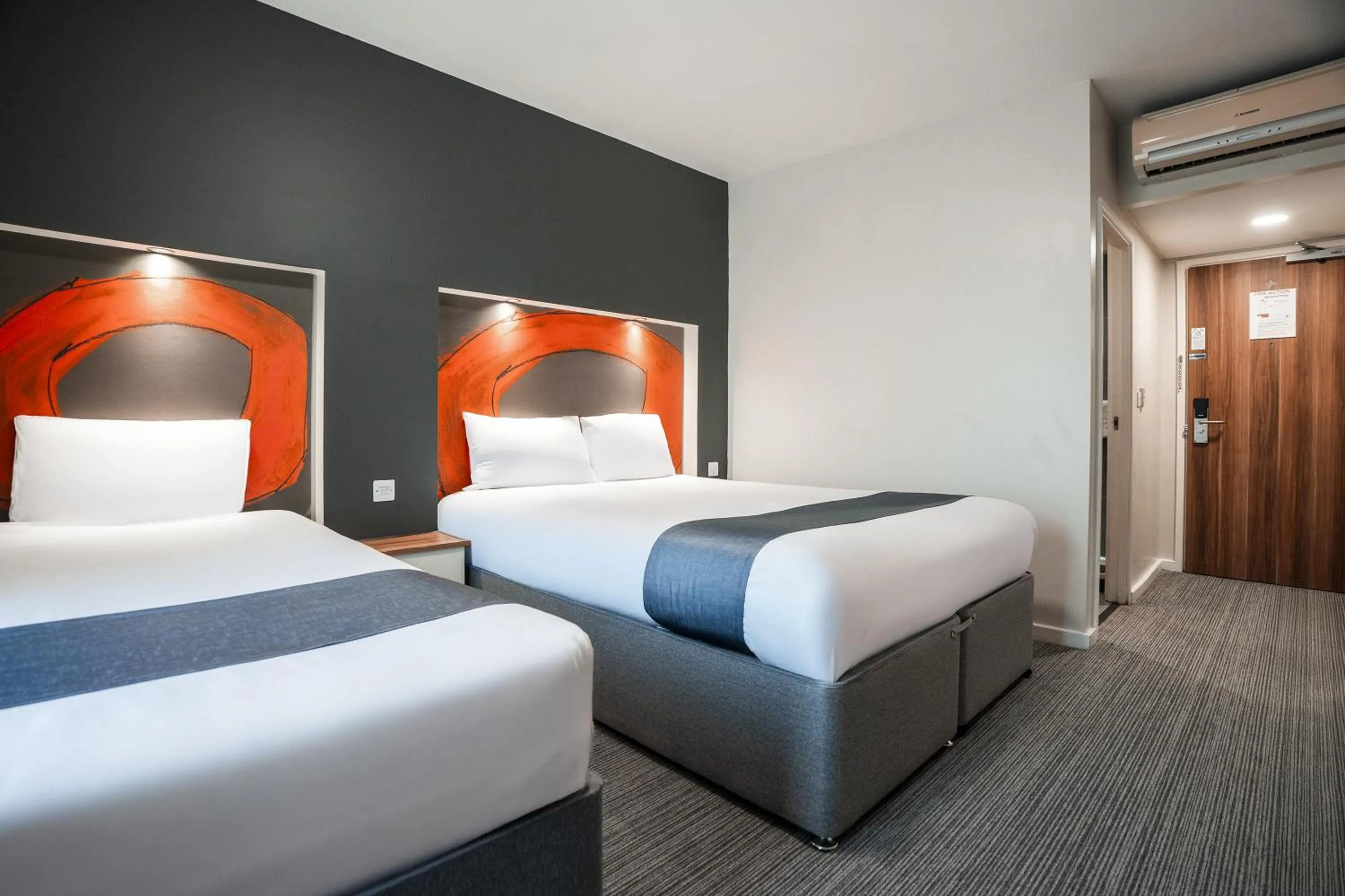 Bed in Ramada London Stansted Airport