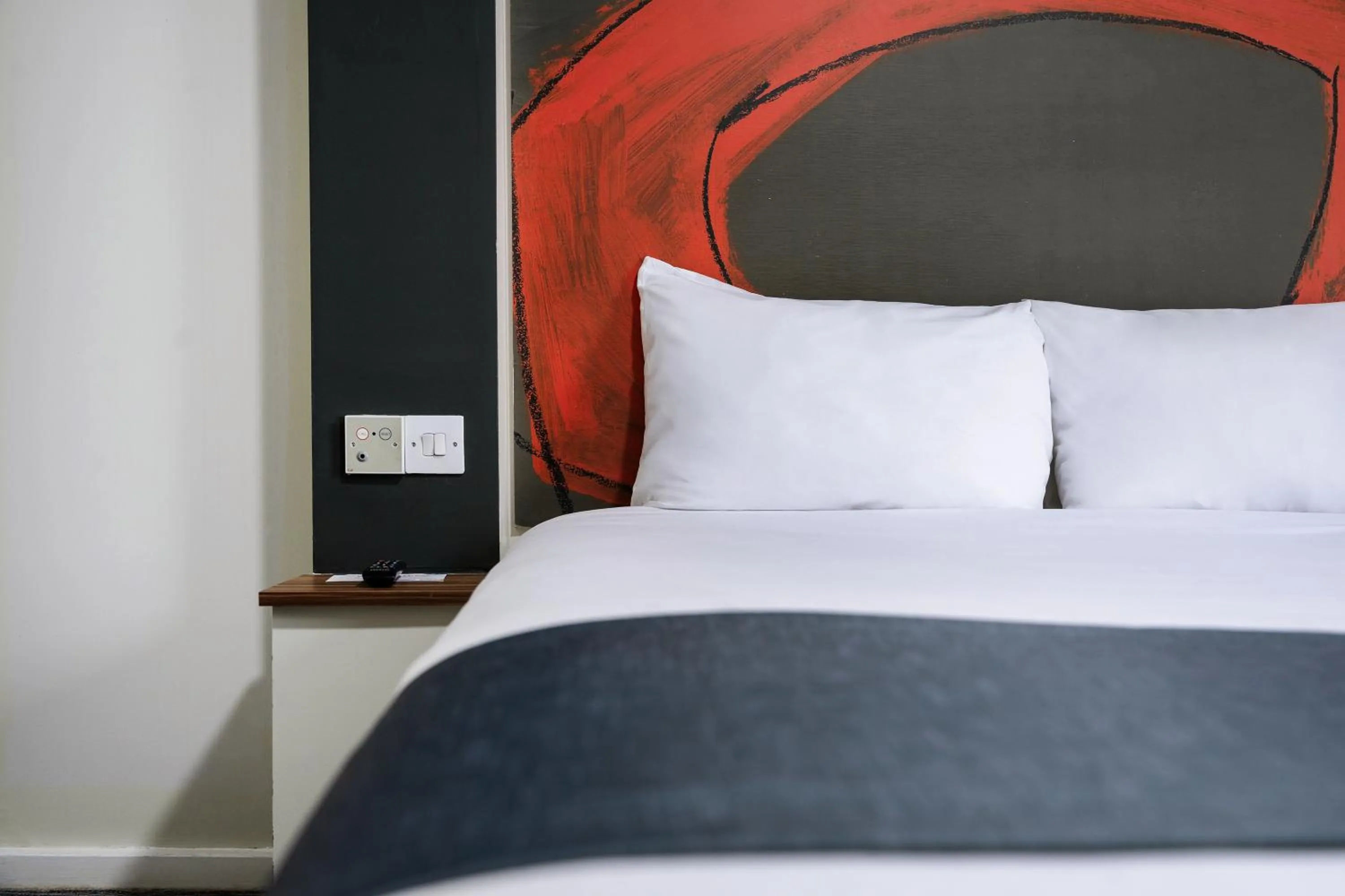 Bed in Ramada London Stansted Airport