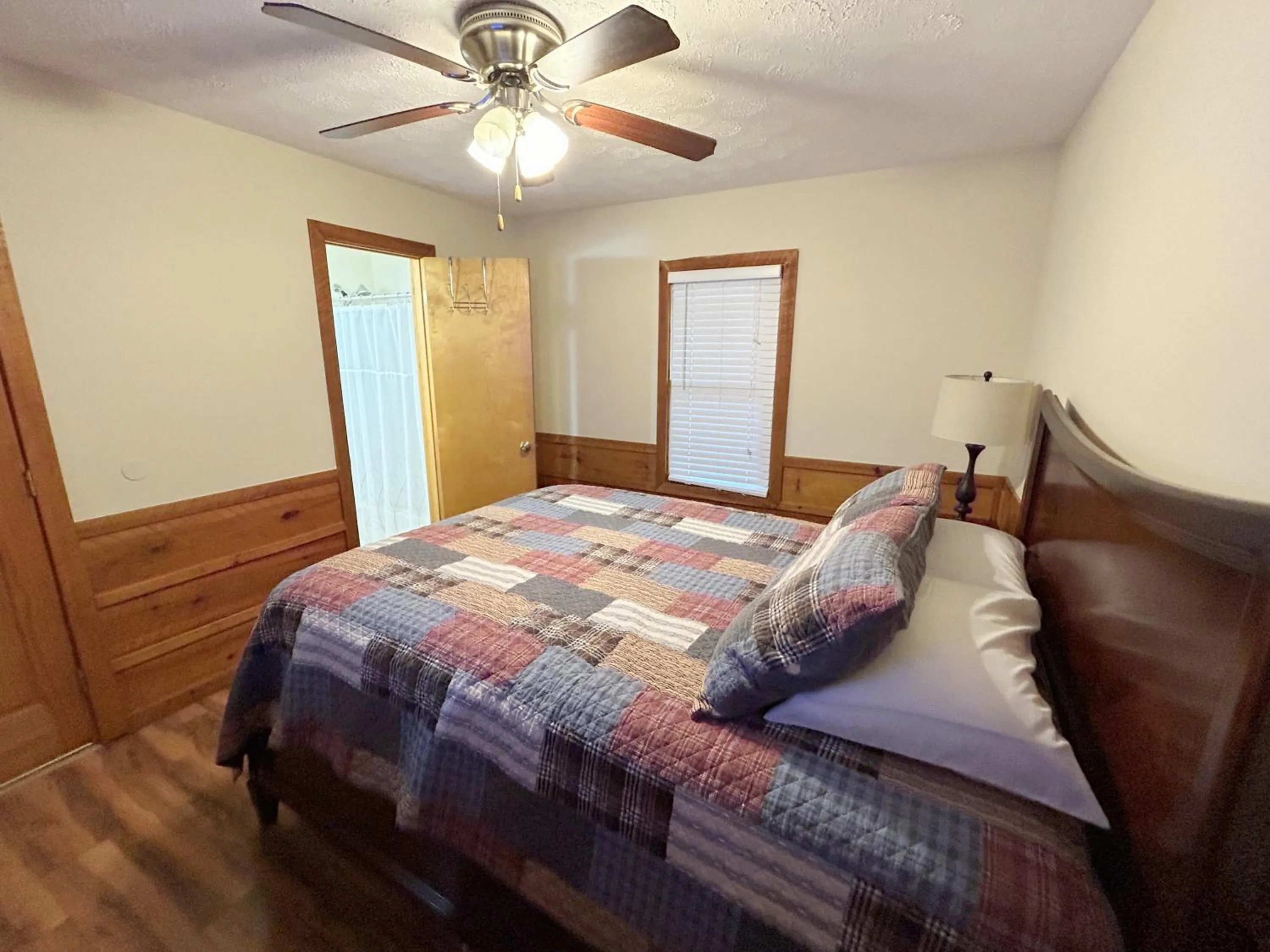 Bed in Tucked Away Cabin