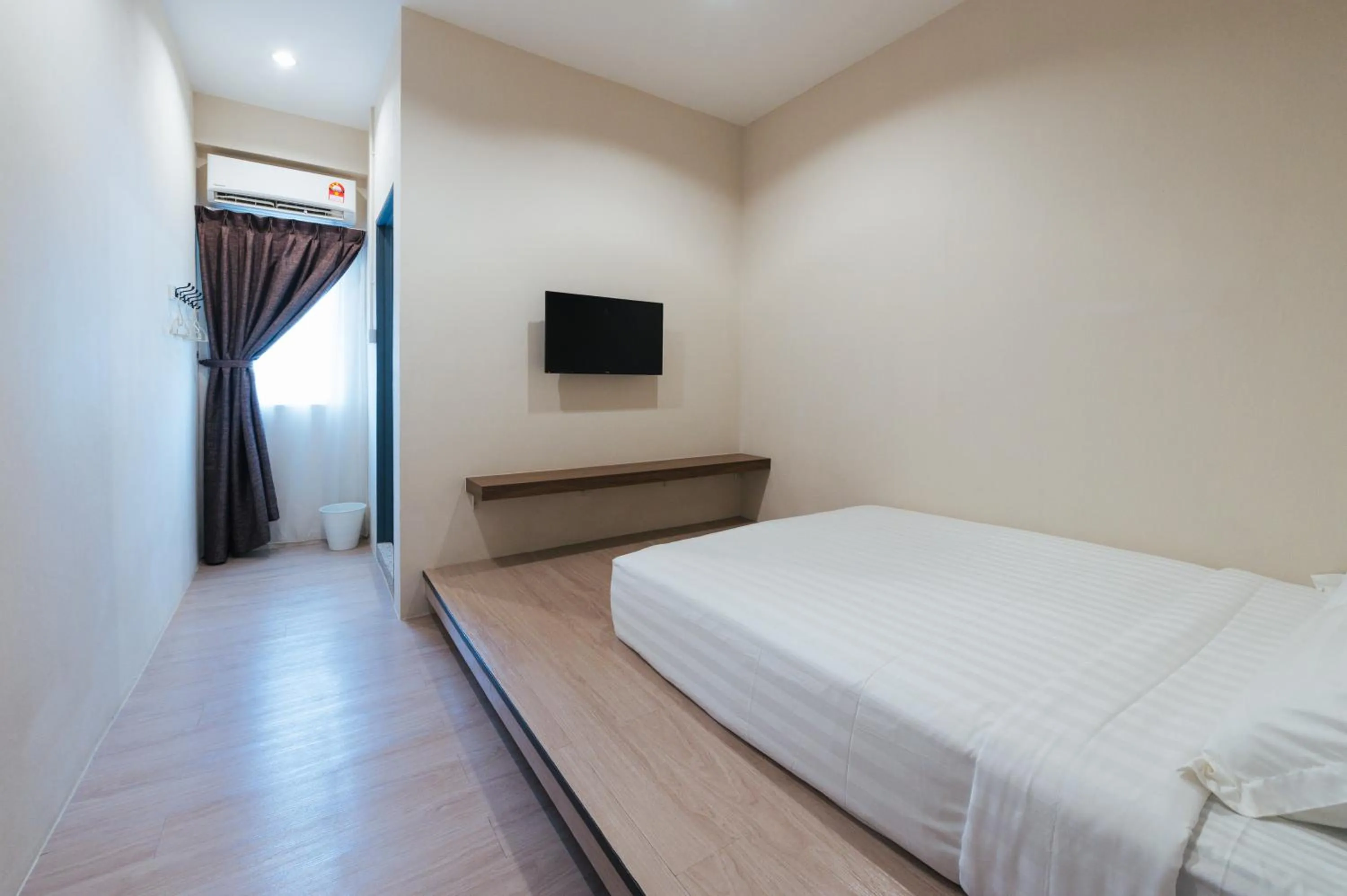 Bed in A° HOTEL Semporna