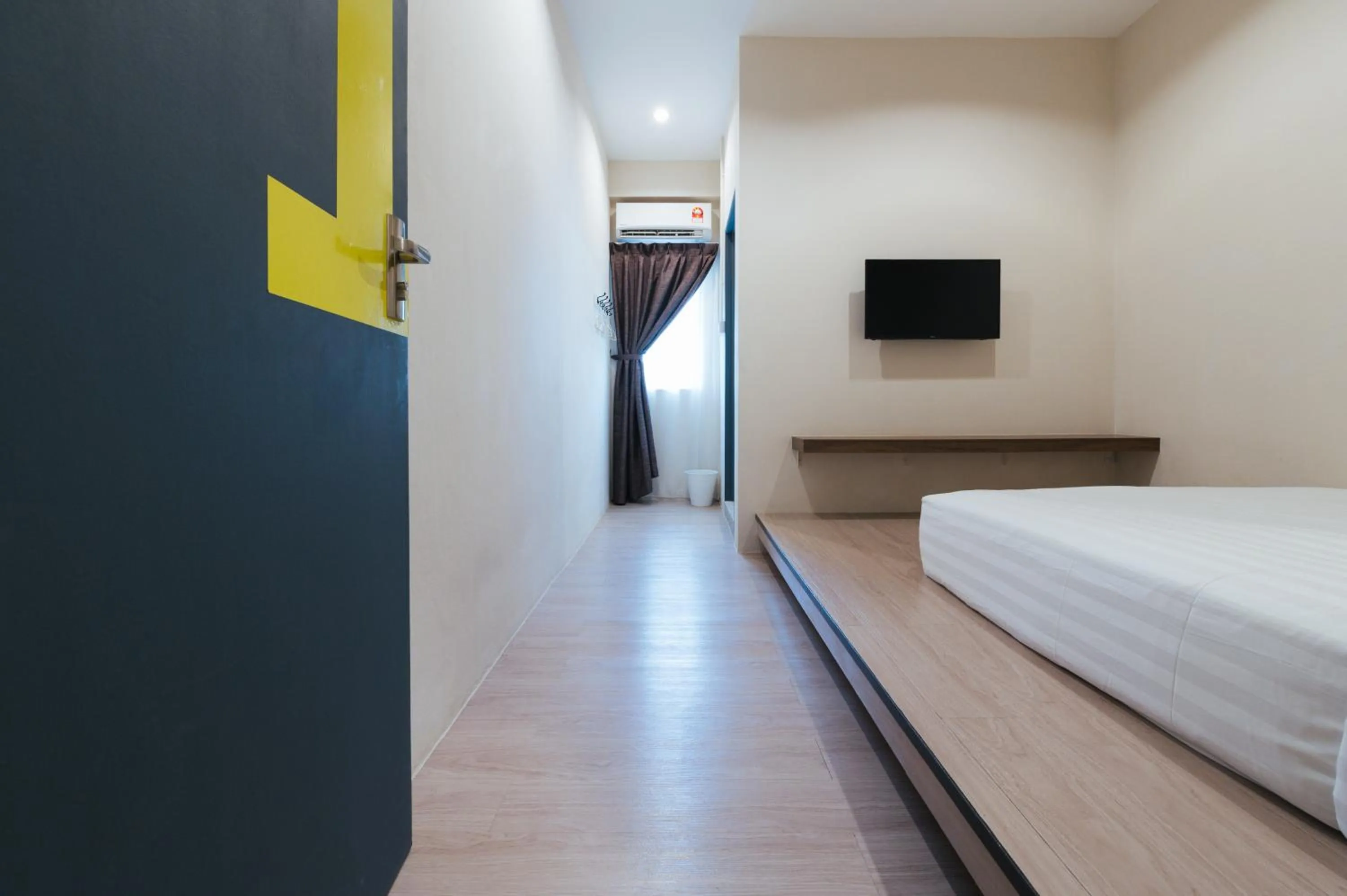 Bed in A° HOTEL Semporna