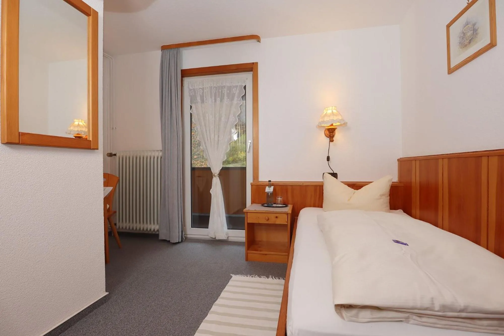Photo of the whole room, Bed in Landgasthaus Kurz Hotel & Restaurant am Feldberg - Schwarzwald