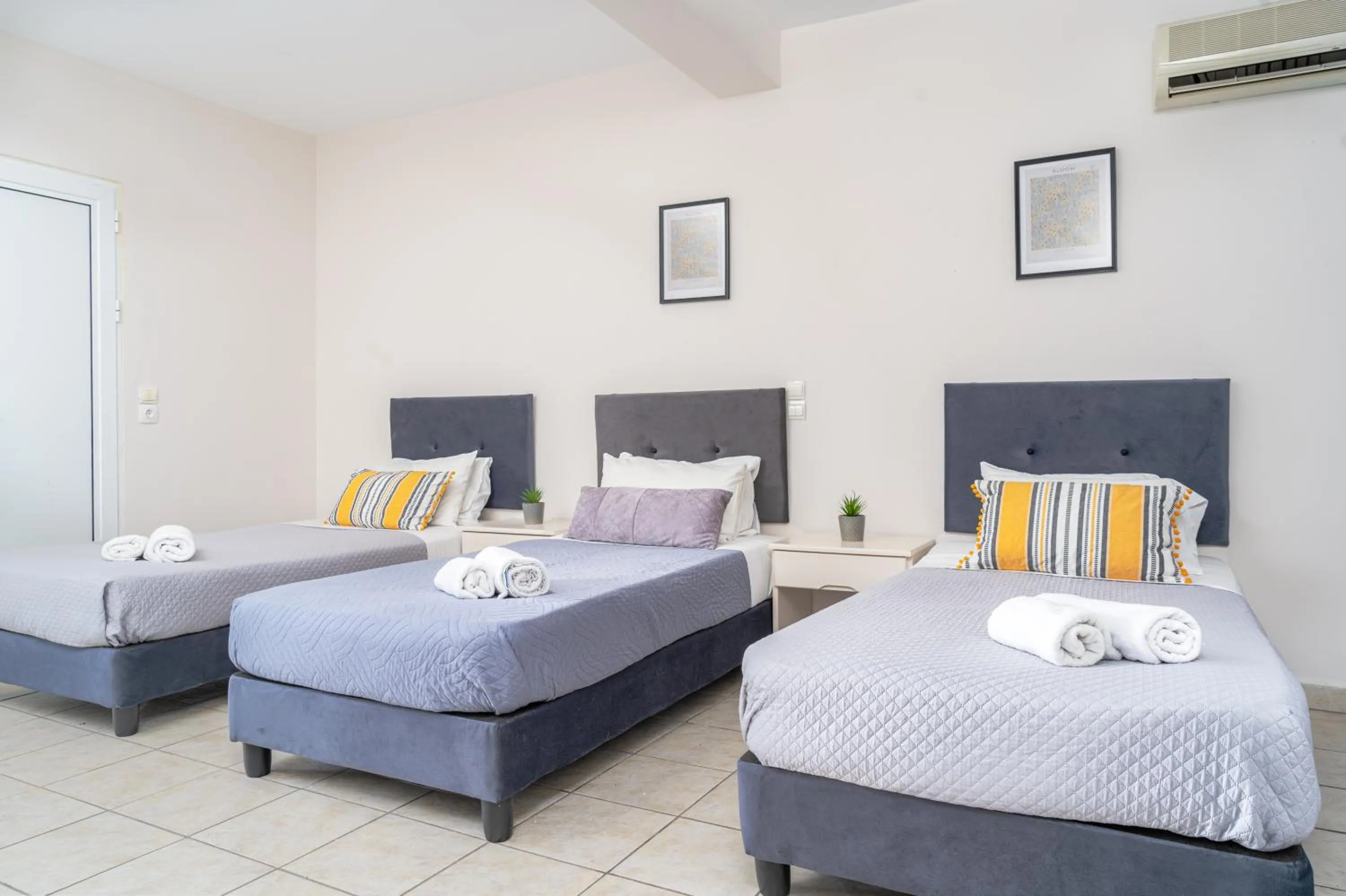 Bed in Blue Palm Hotel