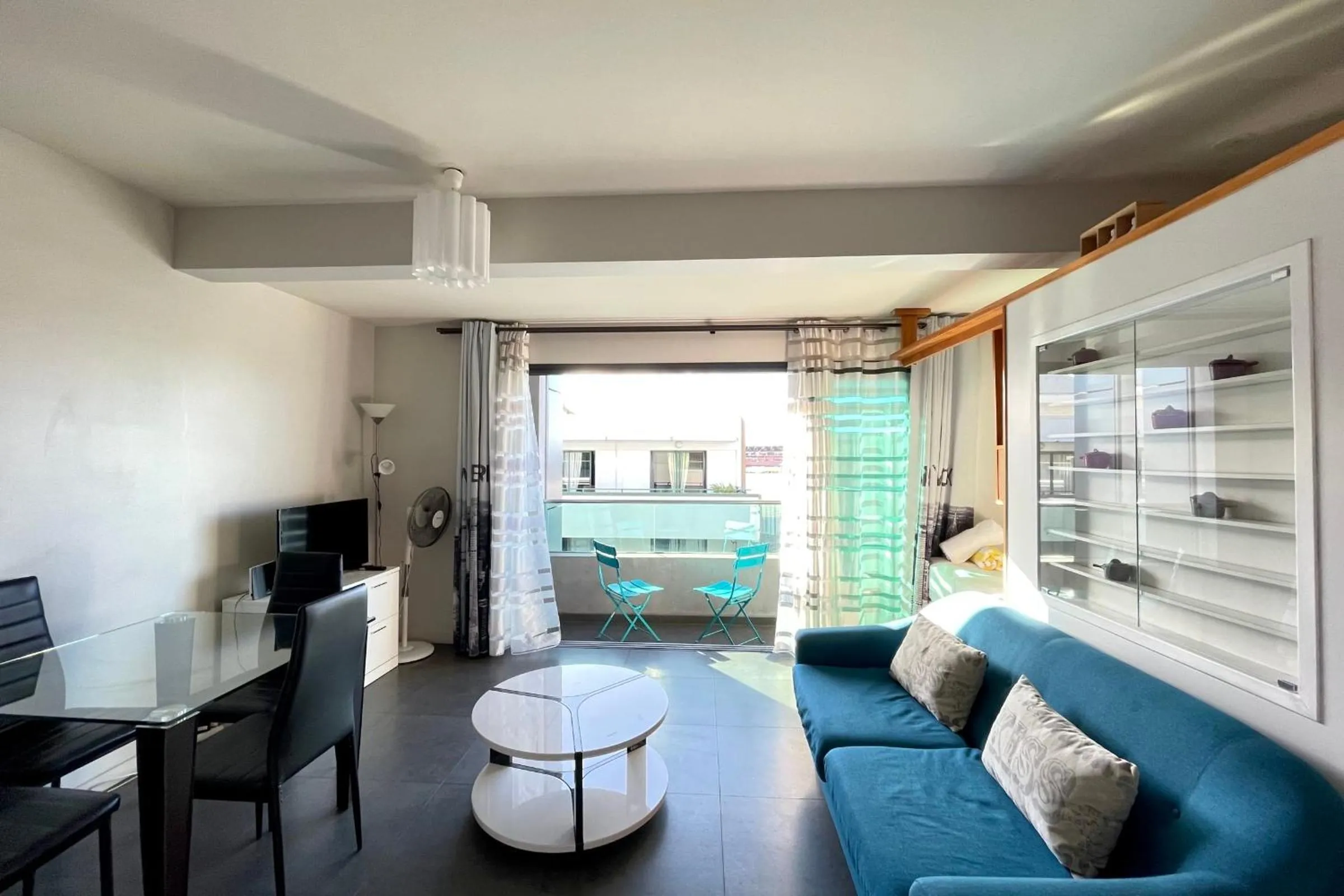 Living room in Moana Studio - downtown Papeete - WiFi AC Netflix parking - 3 people