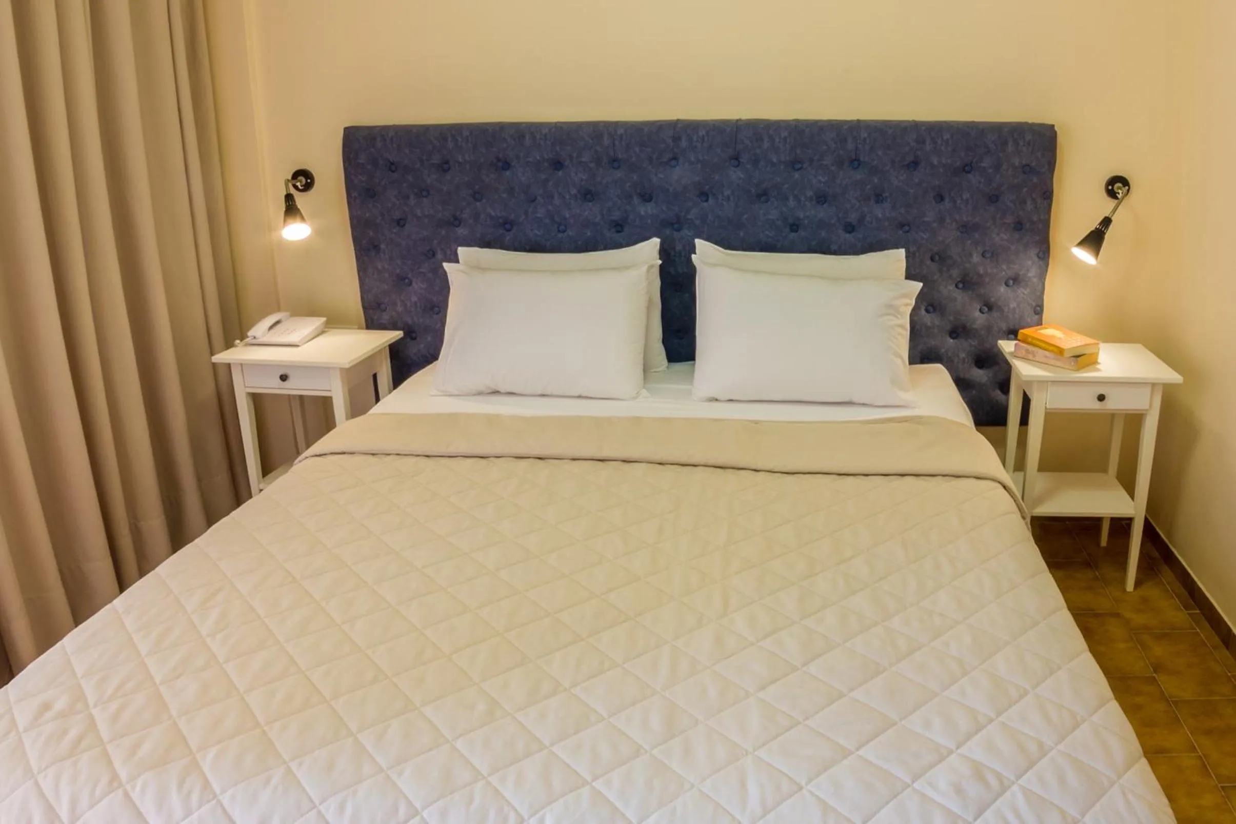 Bed in Pitsakis Hotel