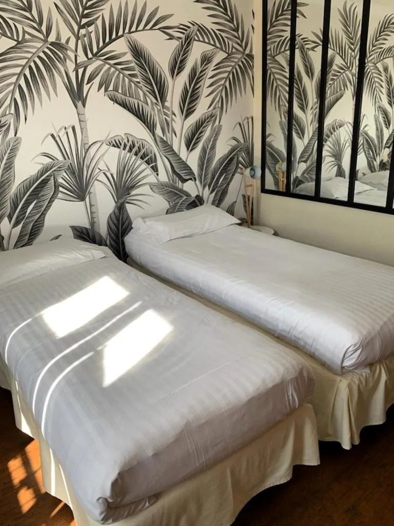 Bedroom, Bed in Logis Hôtel Le Central