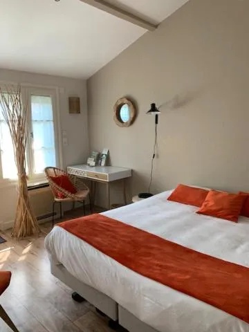 Bedroom, Bed in Logis Hôtel Le Central