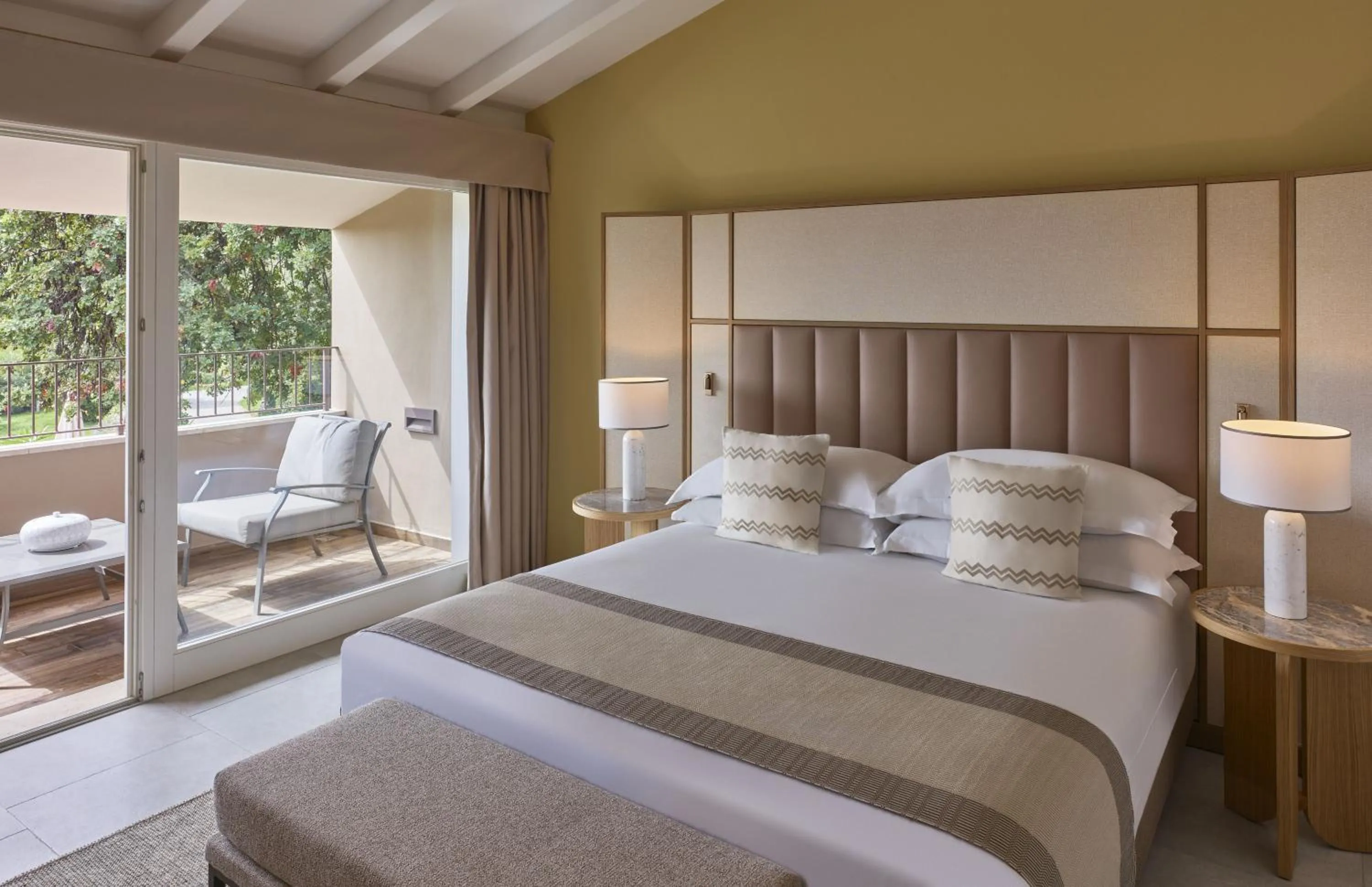 Photo of the whole room, Bed in Conrad Chia Laguna Sardinia