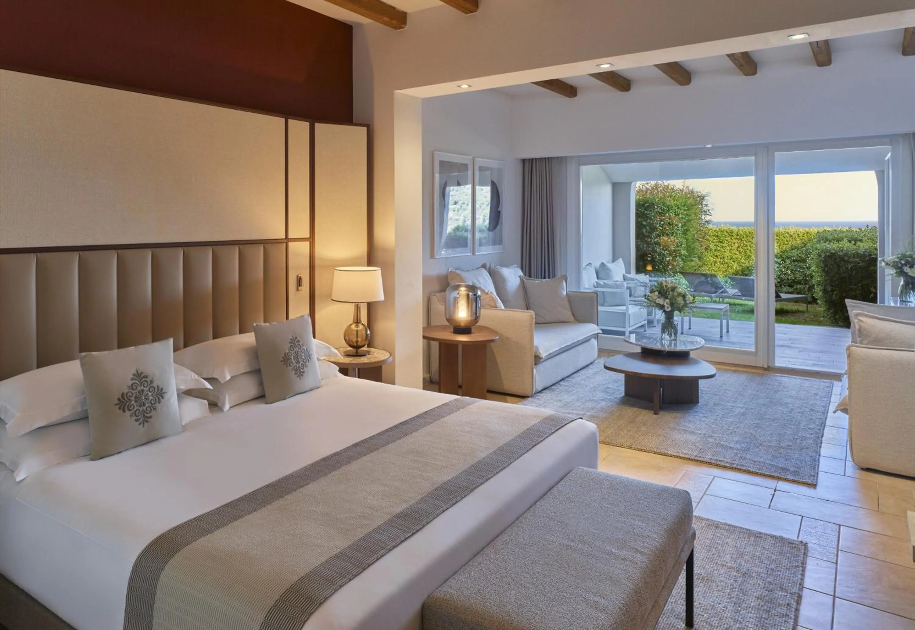 Photo of the whole room, Bed in Conrad Chia Laguna Sardinia