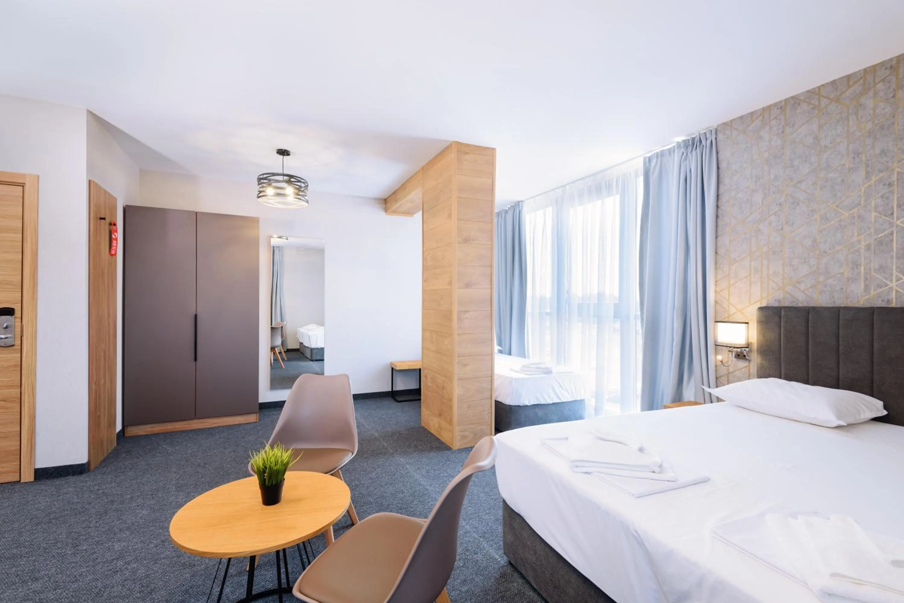 Bed in Avenue Hotel Deluxe